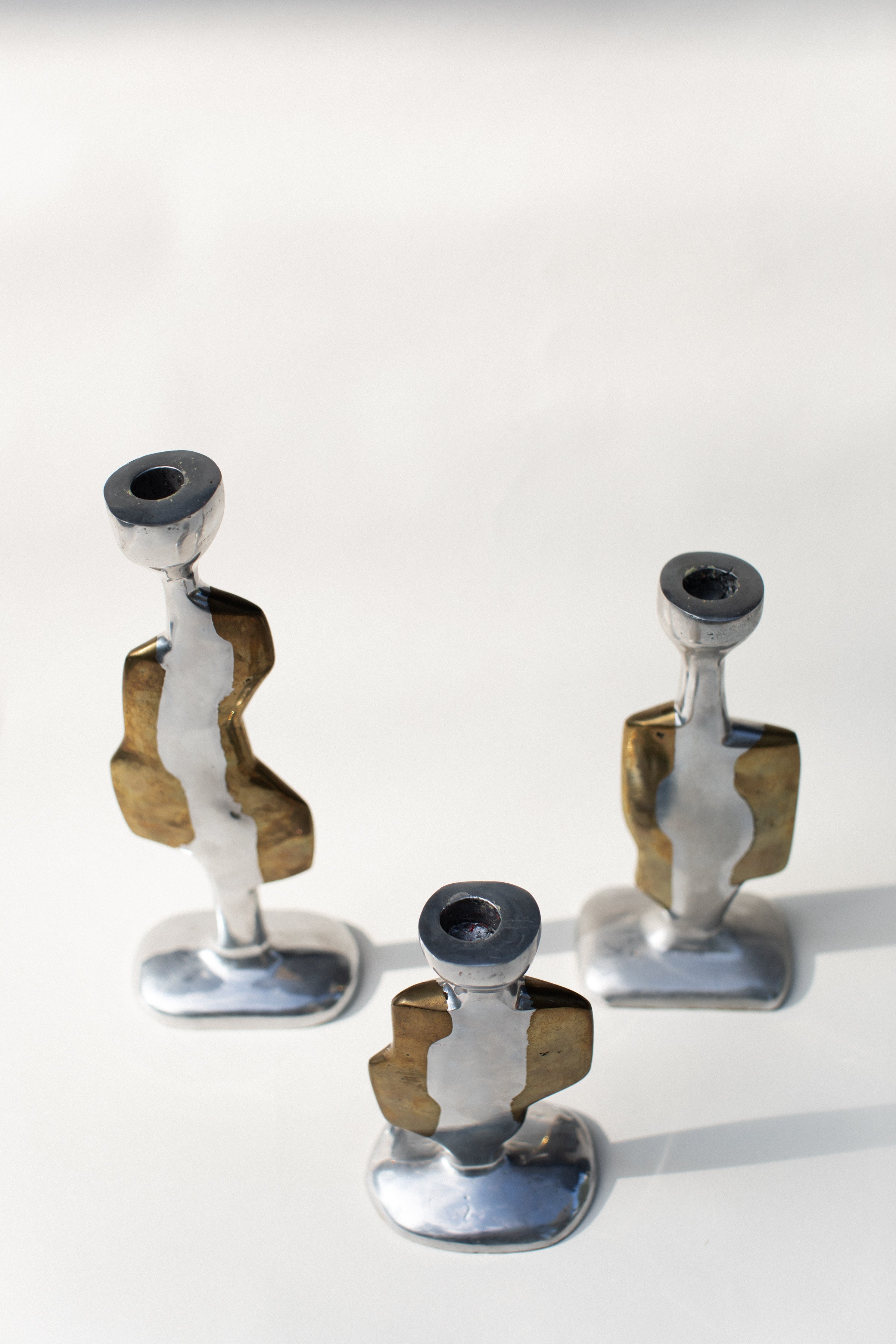 Three Brutalist Candleholders
