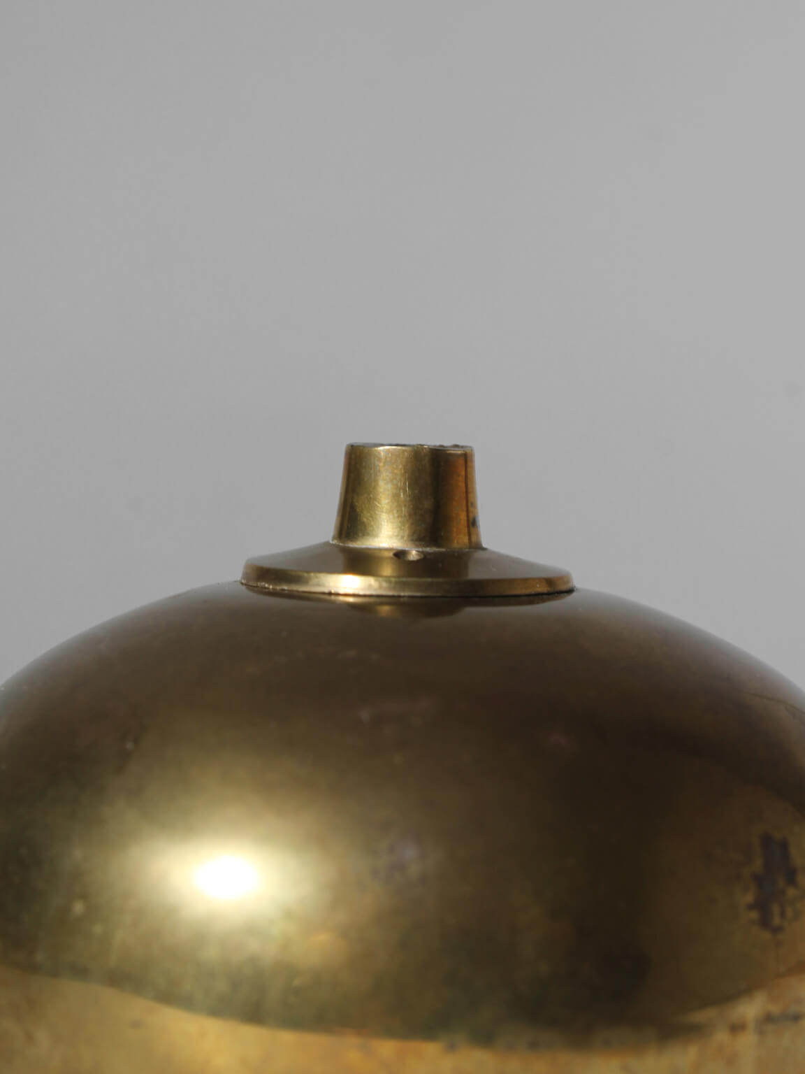 Brass Oil Lamp, Small — close-up of polished brass top