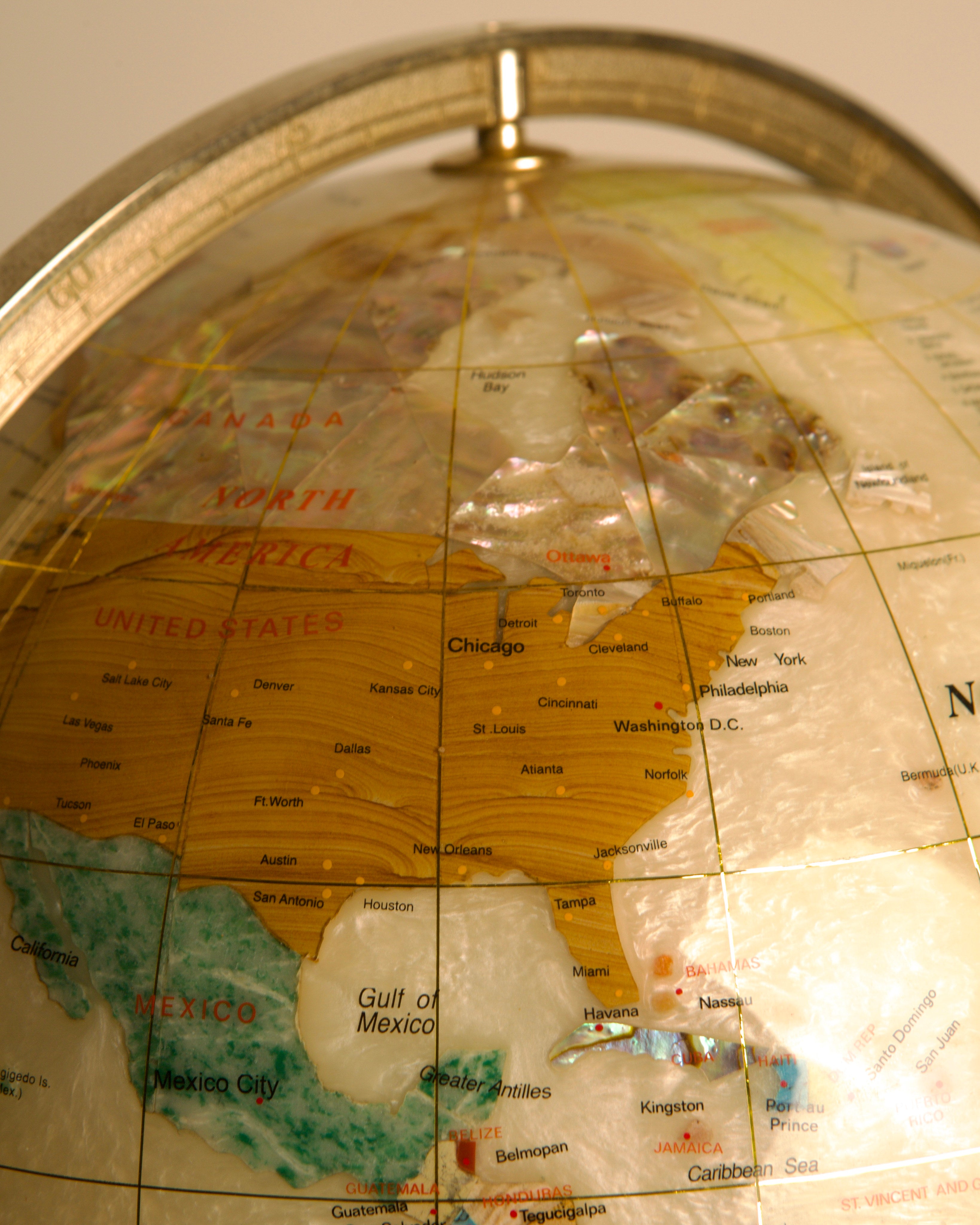Large Globe Made of Hardstone and Mother-of-pearl, 1970s — close-up of globe showing North America details