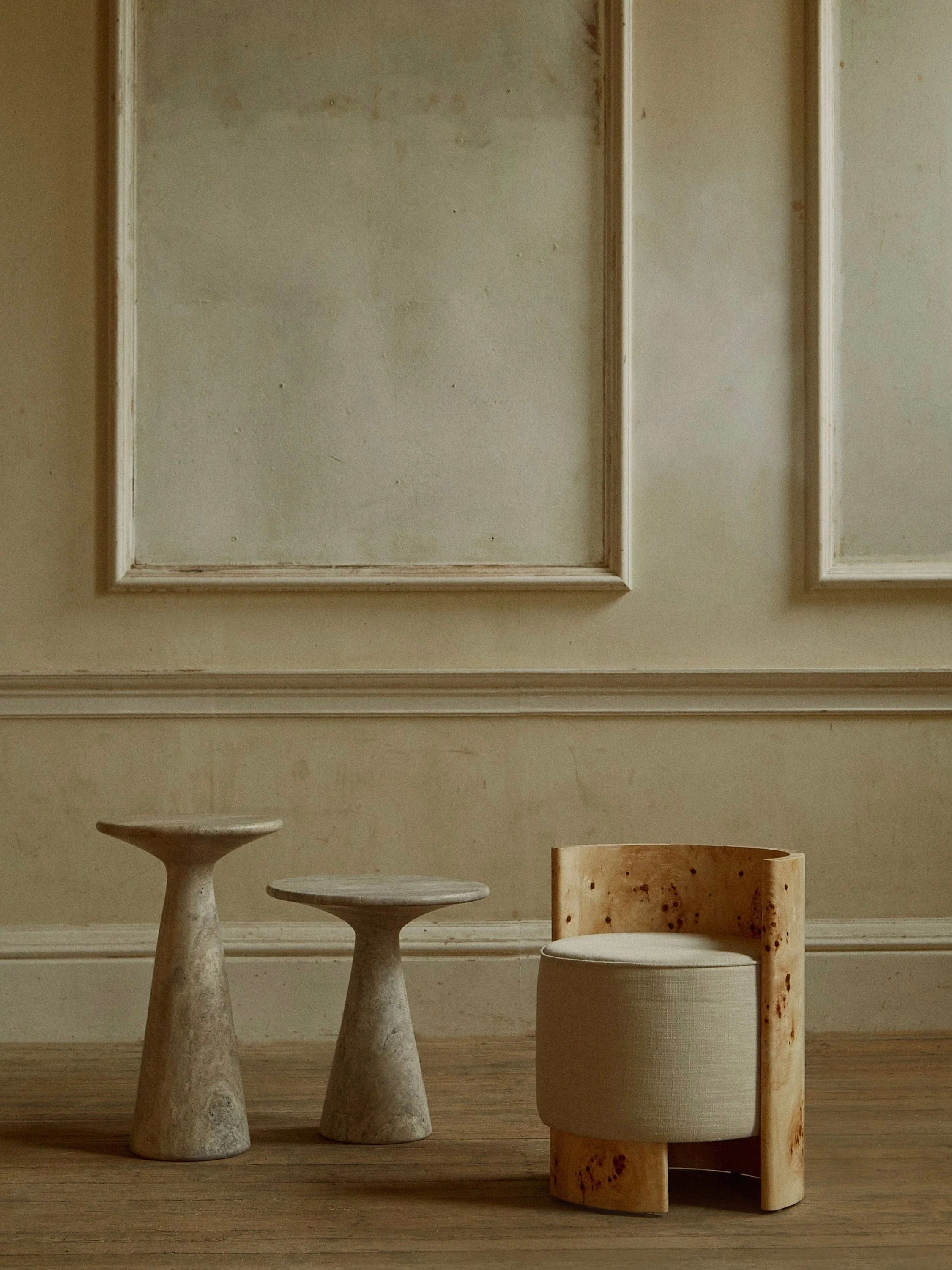 Juno Tall Travertine Side Table — lifestyle setting