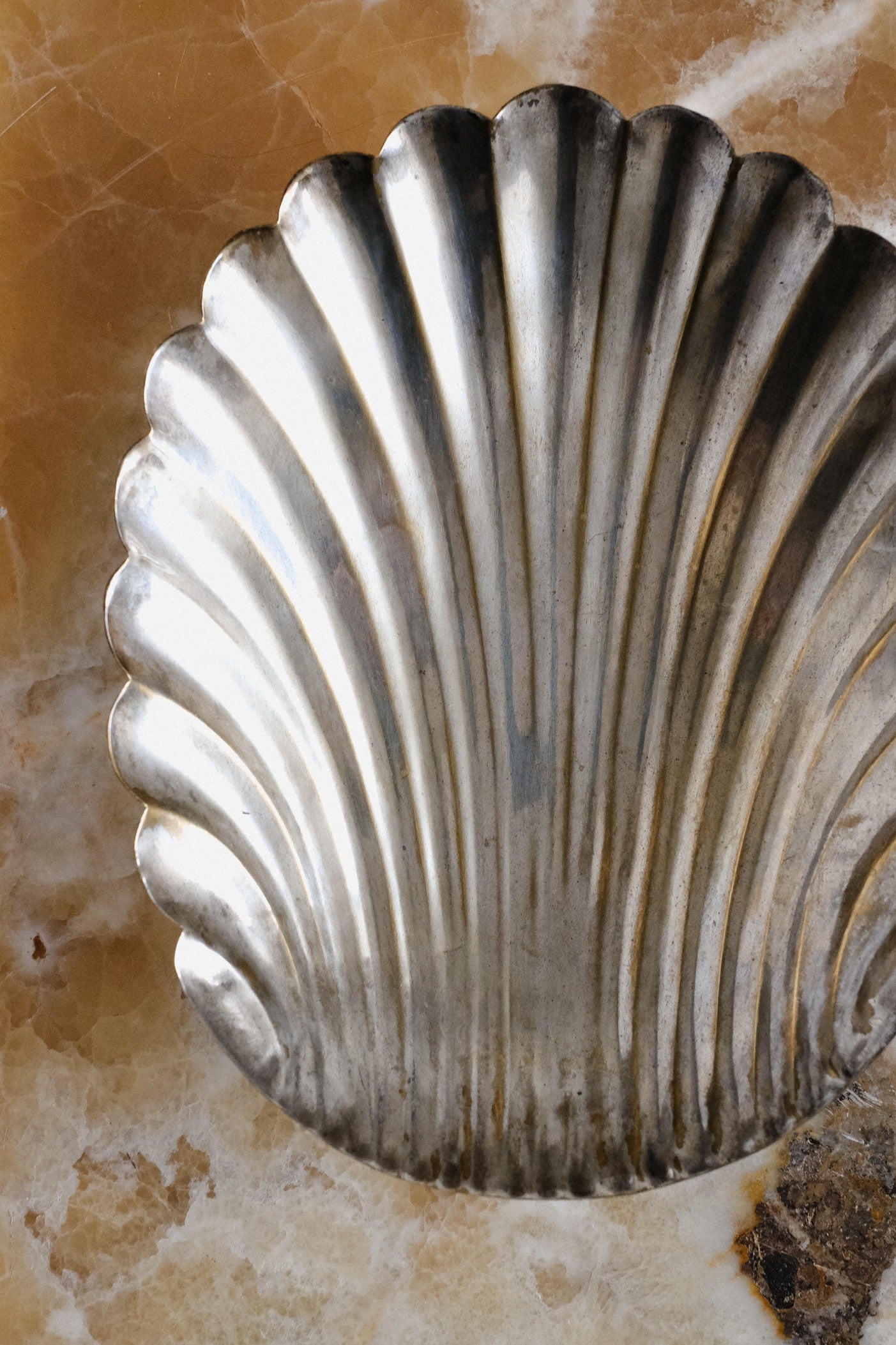 Silver-plated Bowl — top view highlighting ribbed texture on marble surface