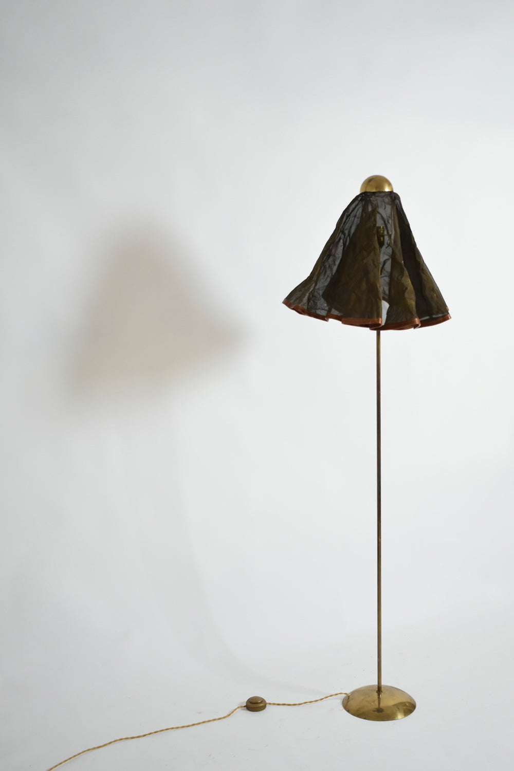 Brass, Brass Fabric and Leather Floor Lamp, 1960s — angled view in minimalist setting