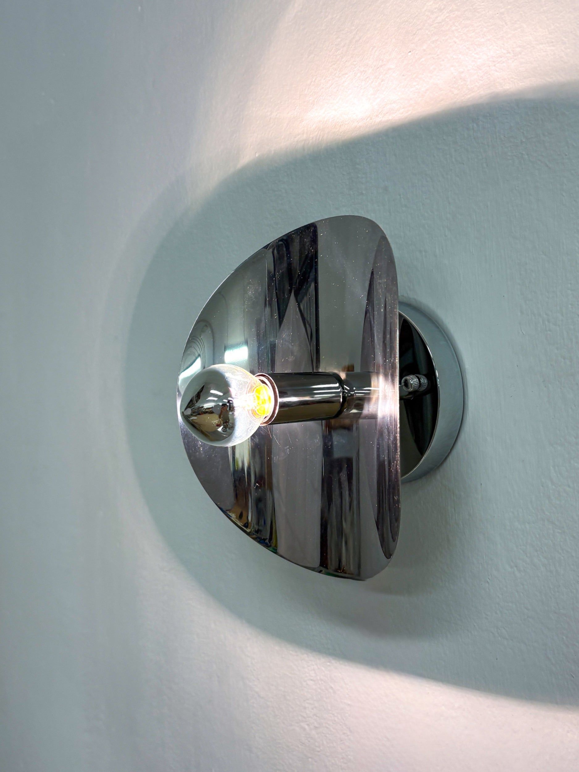 Folio" Sconce, Chromed Metal, Italy, 1970s — side angle showing reflective surface