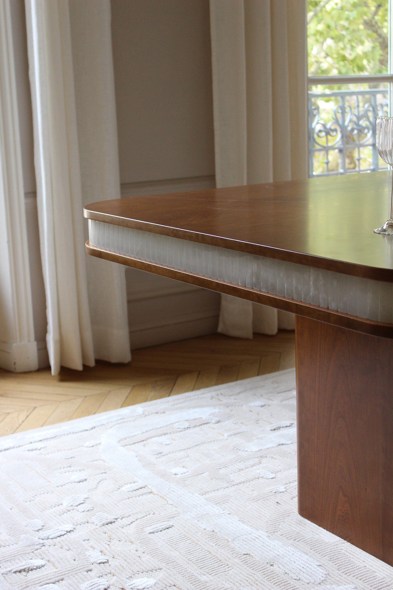 Doppio Wood And White Onyx Dining Table — close-up of wood and onyx edge