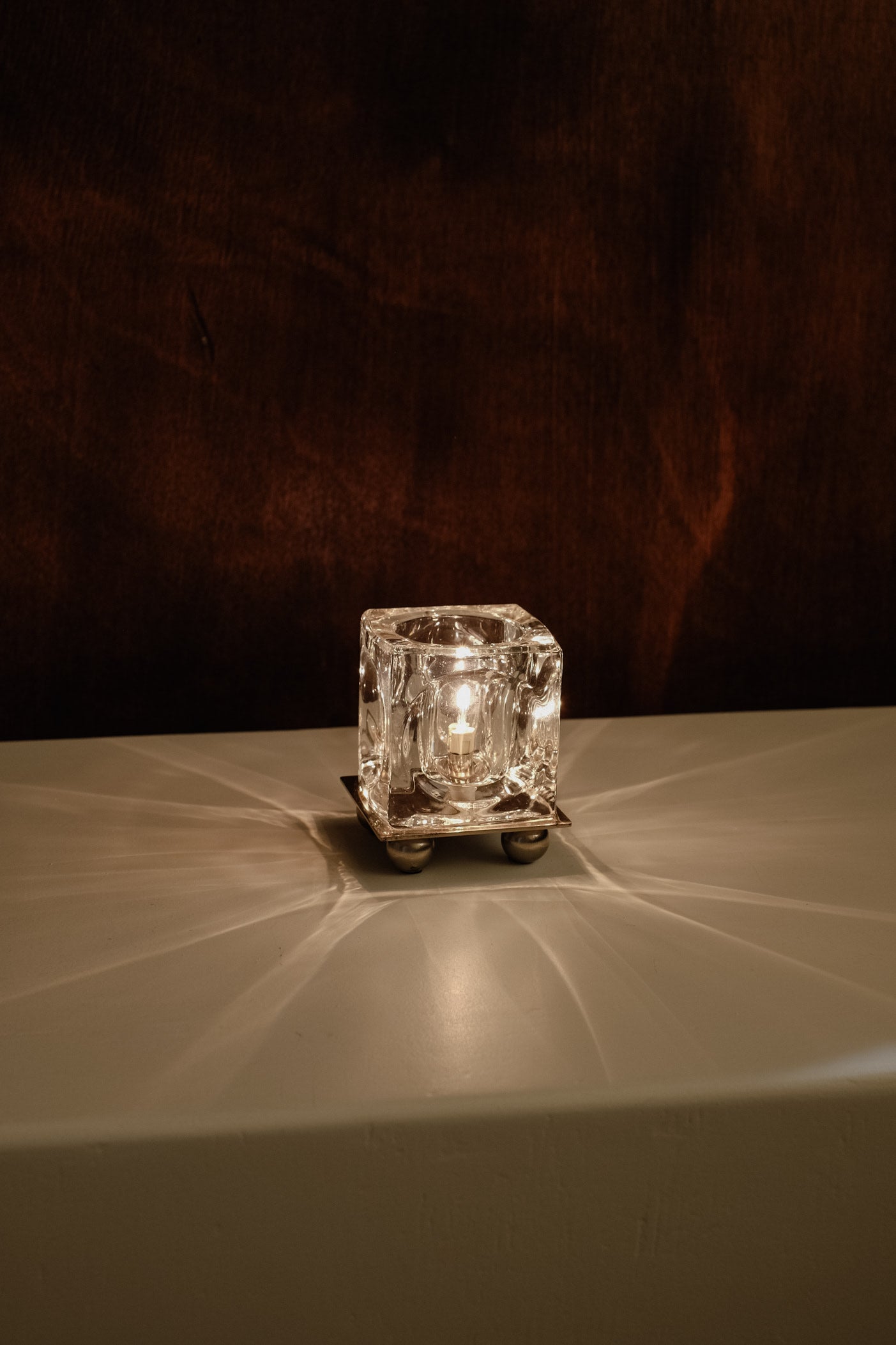 Ice Cube' Table Lamp — illuminated crystal lamp on white surface