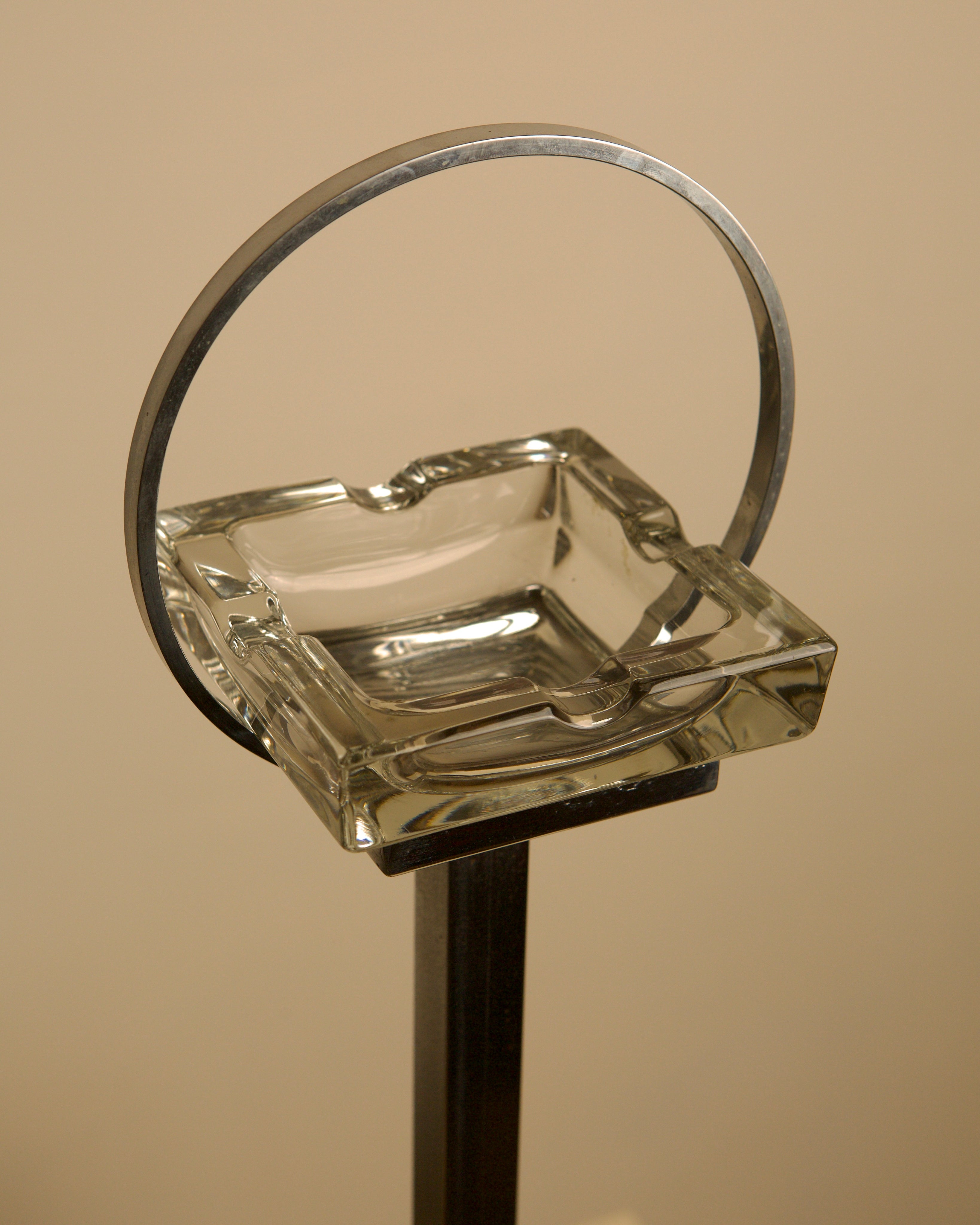 Italian Crystal Ashtray on a Chromed Metal Stand, 1950s — close-up of glass ashtray with metal ring