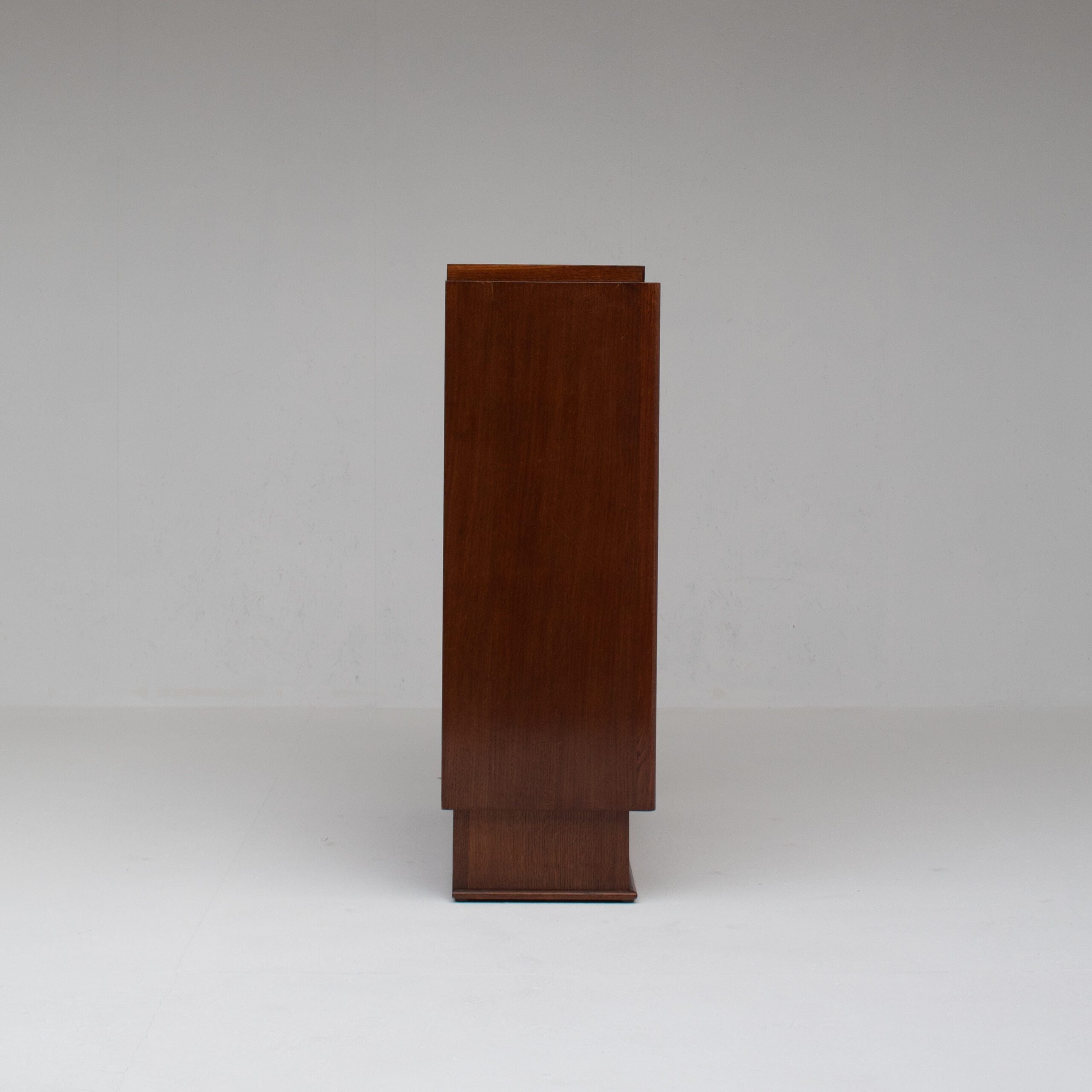 Mid-Century Oak Cabinet with Brass Handles and Decorative Inlays — close-up