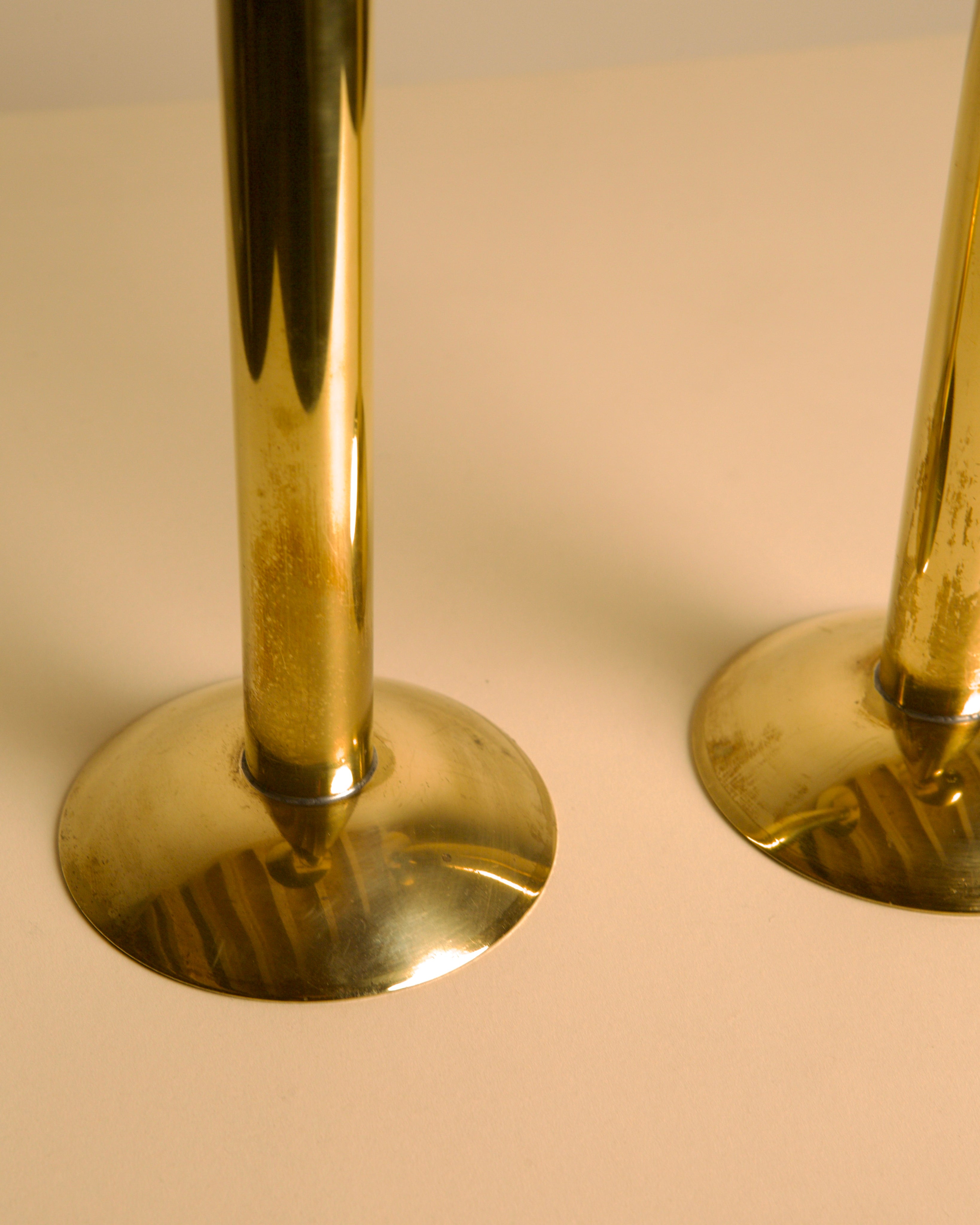 Pair of Large Danish Brass Candleholders 1960s — close-up of polished brass base