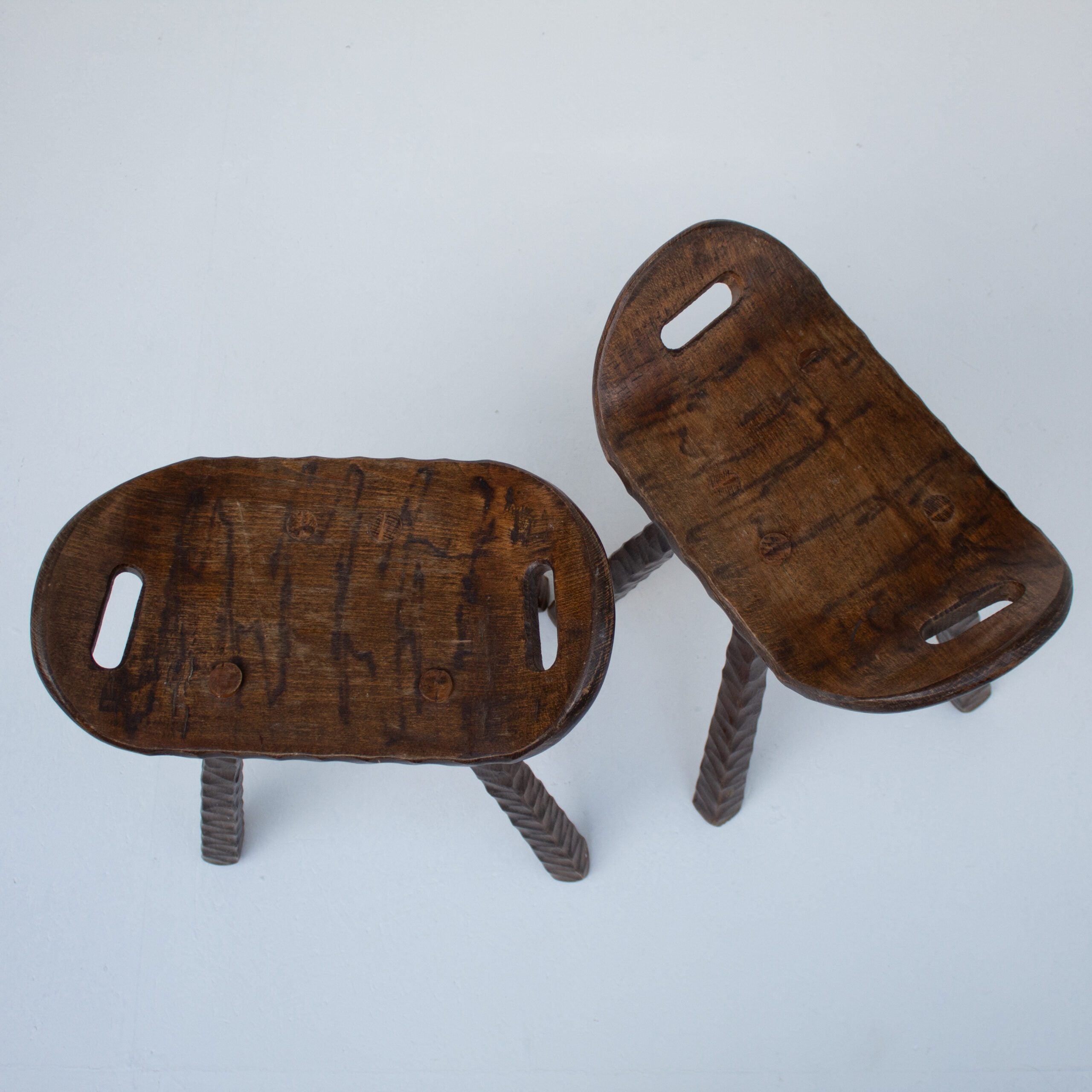 Set of Brutalist stools — top view of handcrafted wooden seats
