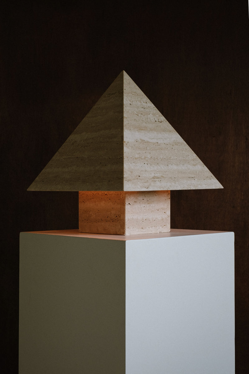 Travertine Pyramid Table Lamp — close-up of textured stone base