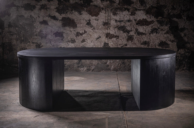 Encino Negro Dining Table — close-up of dark wood surface and edges