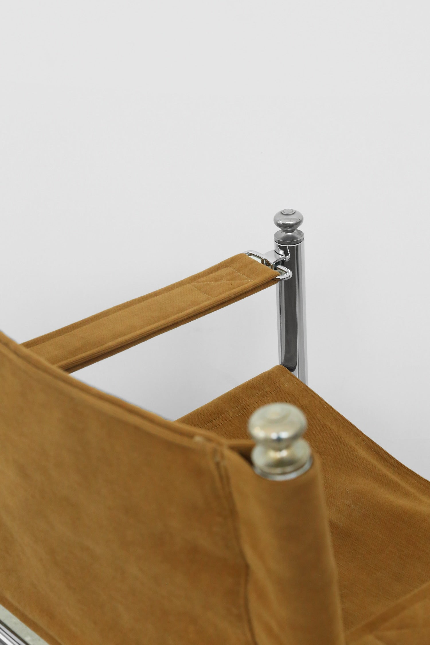 Chrome and Corduroy Arm Chair — close-up
