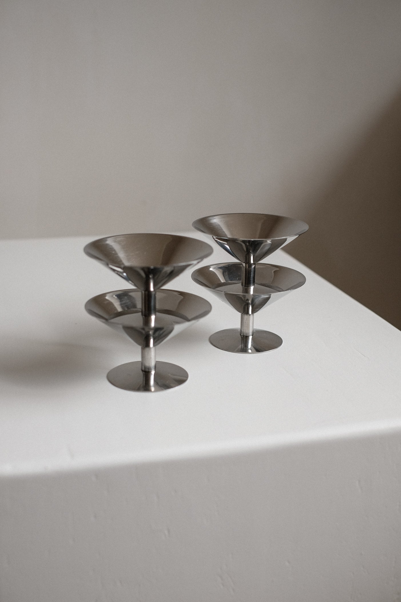 Set of Four Ice Coupes — side angle on white pedestal