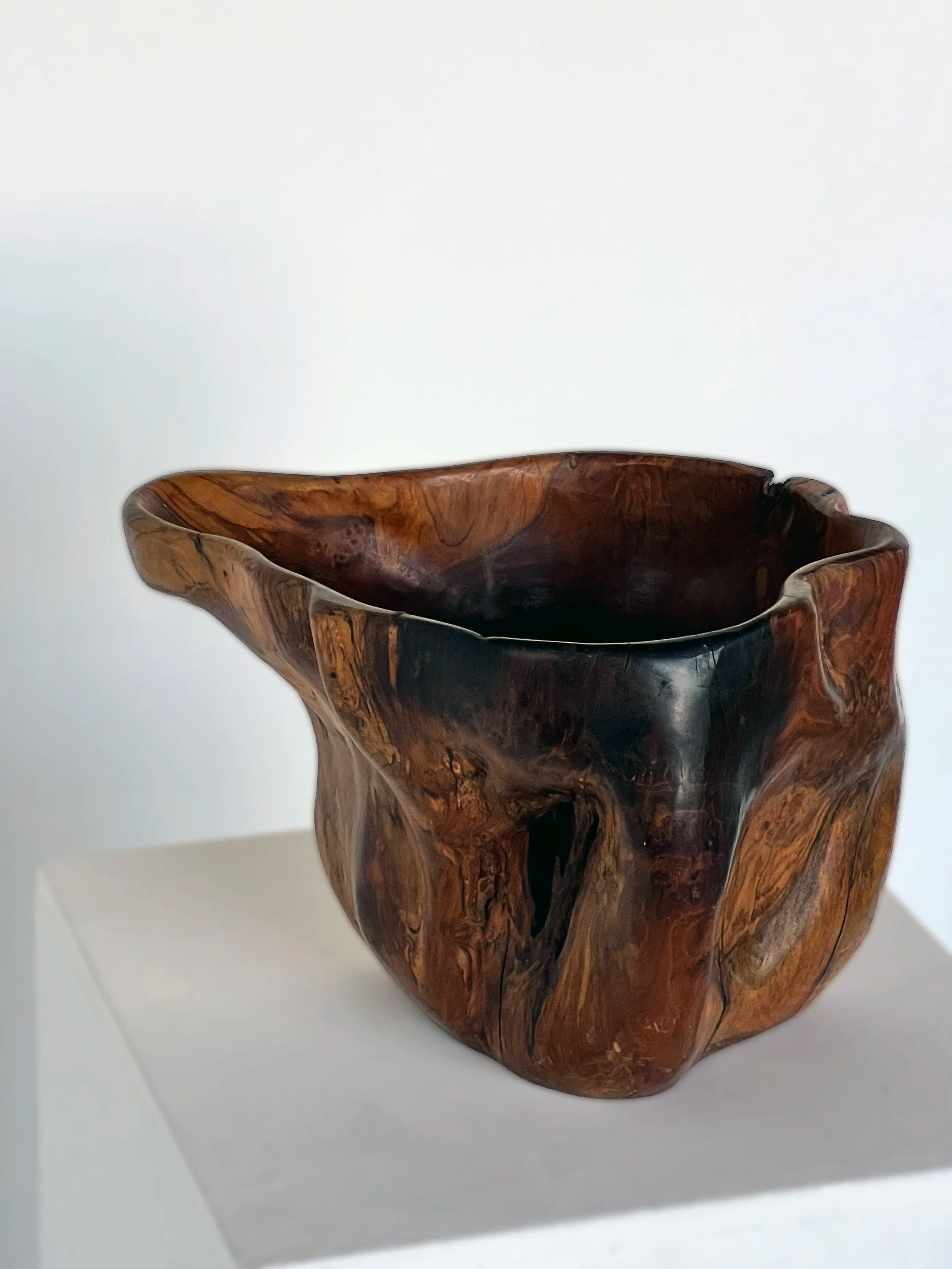 Carved organic form wooden bowl — lifestyle setting