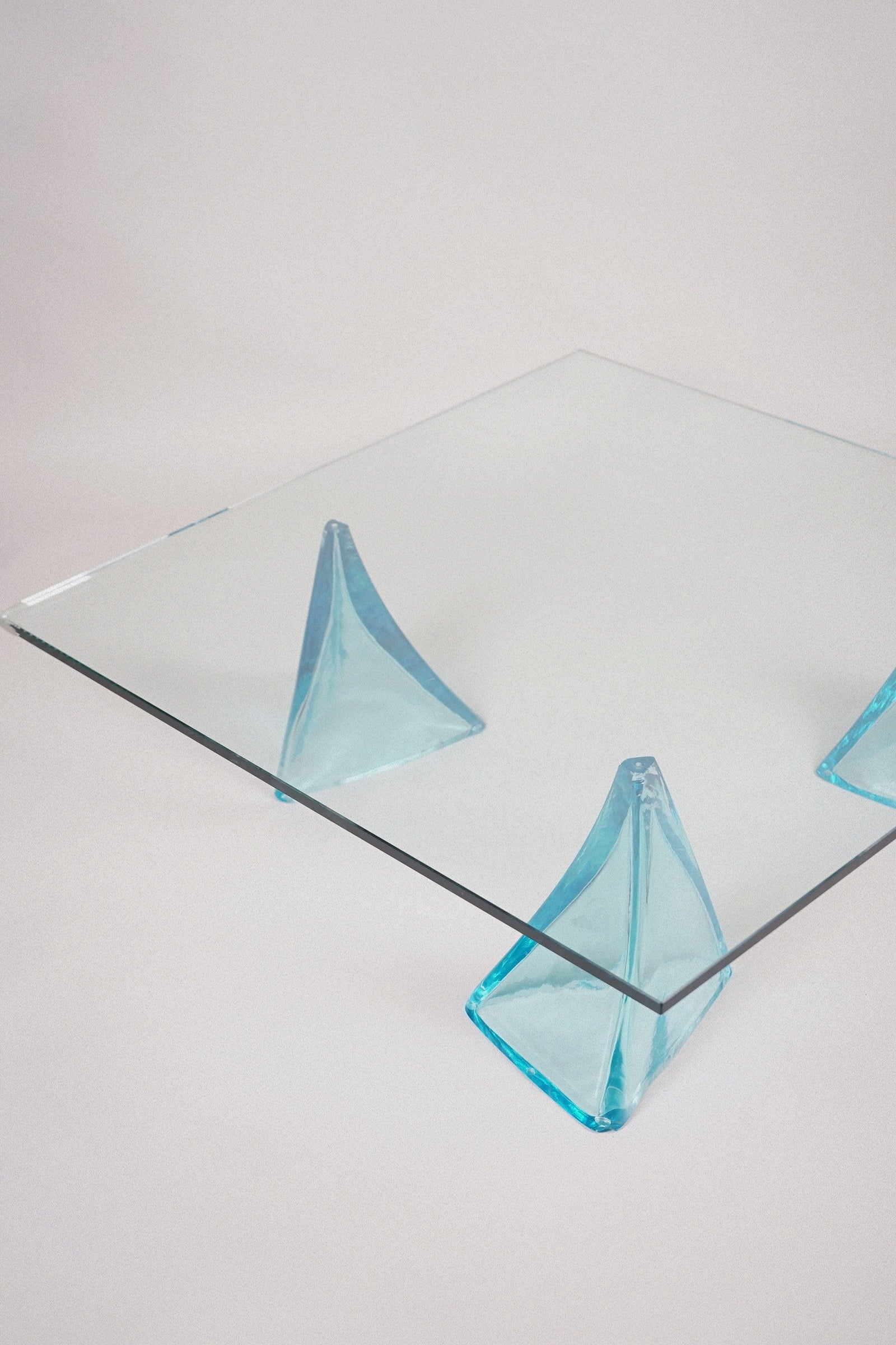 Glass Coffee Table with Sculptural Blue Glass Supports, c.1980s–1990s — side angle showing blue glass supports