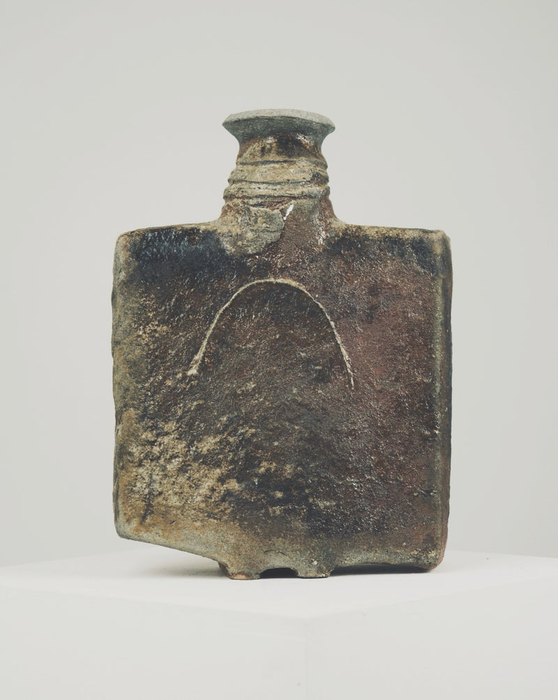 Large square ceramic bottle by Gérard Brossard, weathered surface