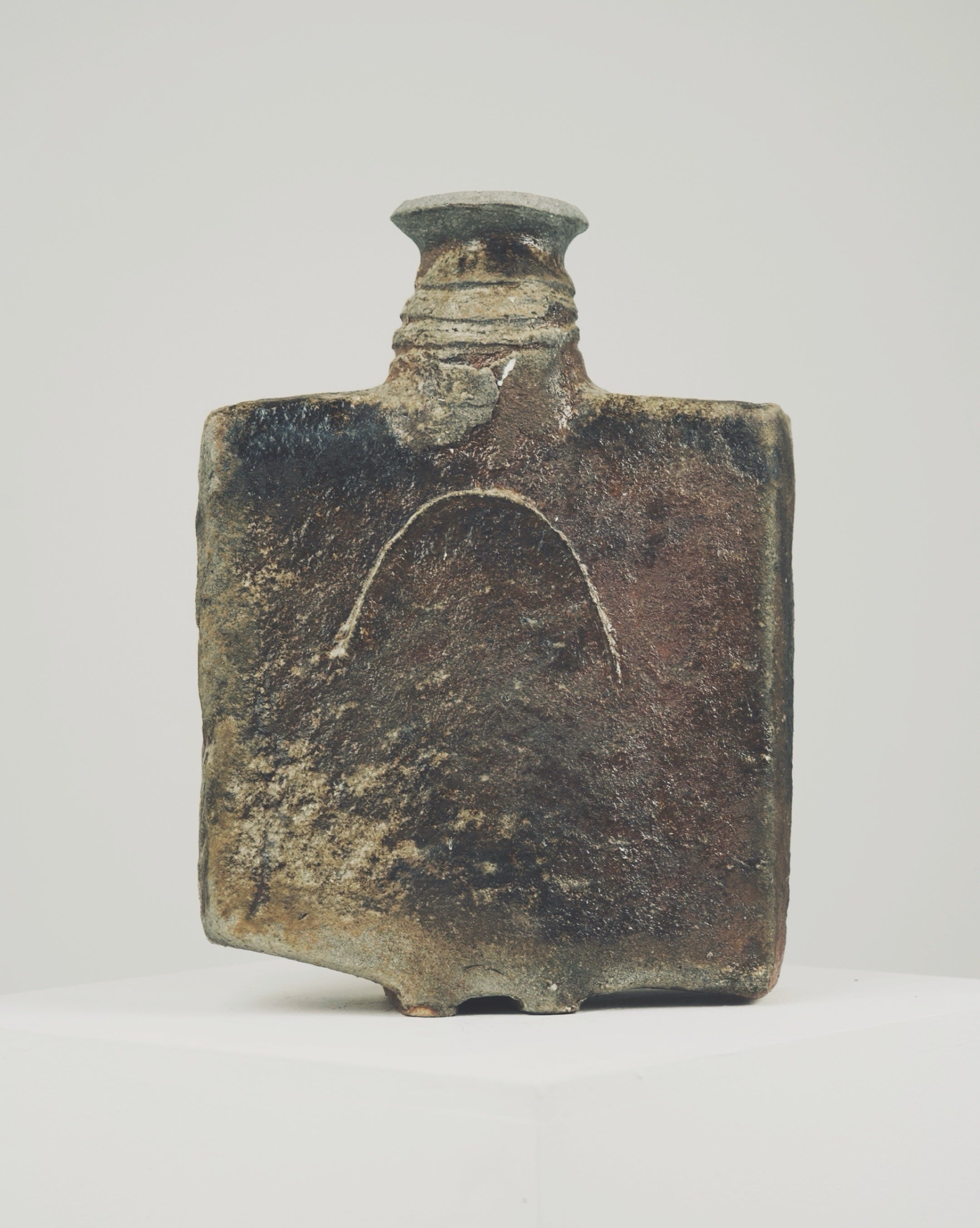 Large square ceramic bottle by Gérard Brossard, weathered surface