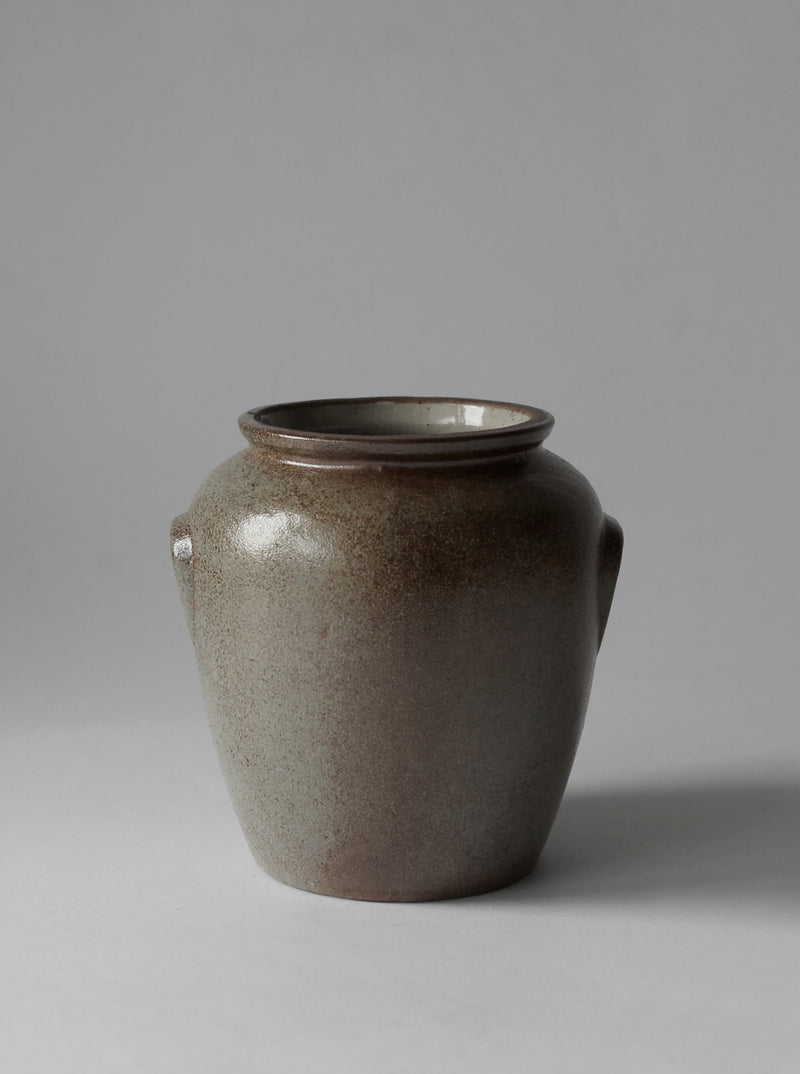 Large glazed ceramic vase in olive green with rounded form