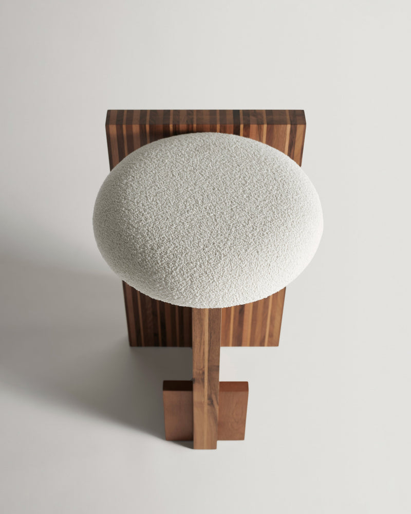 Arquivo Counter Stool — top view of textured white seat and wooden base