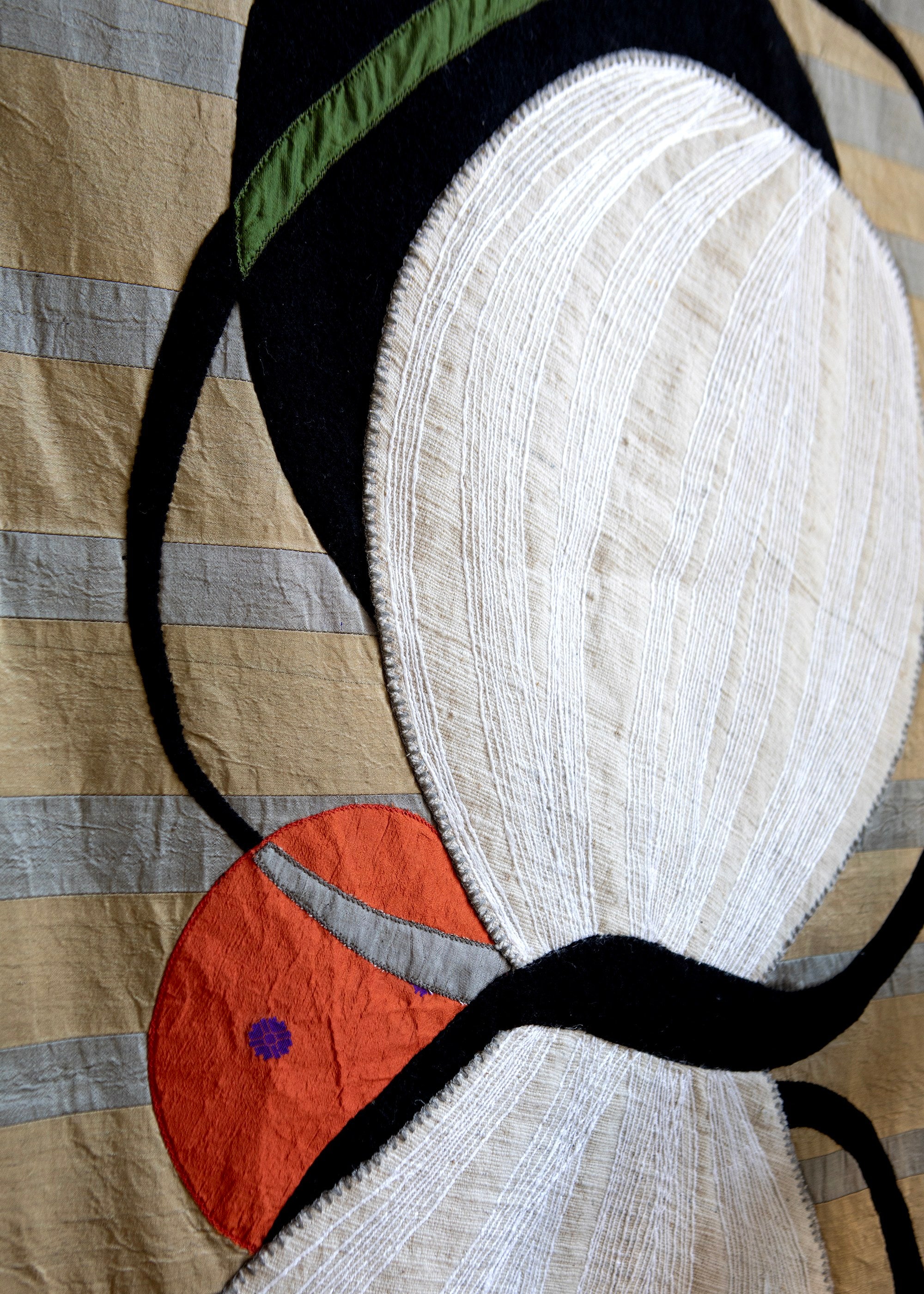 Simple Flight Tapestry — close-up of fabric textures and colors