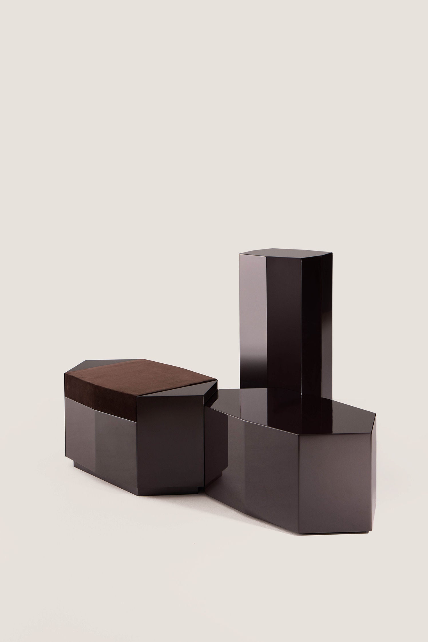 Ame I' Lacquer Ottoman — close-up of dark lacquer finish and suede top