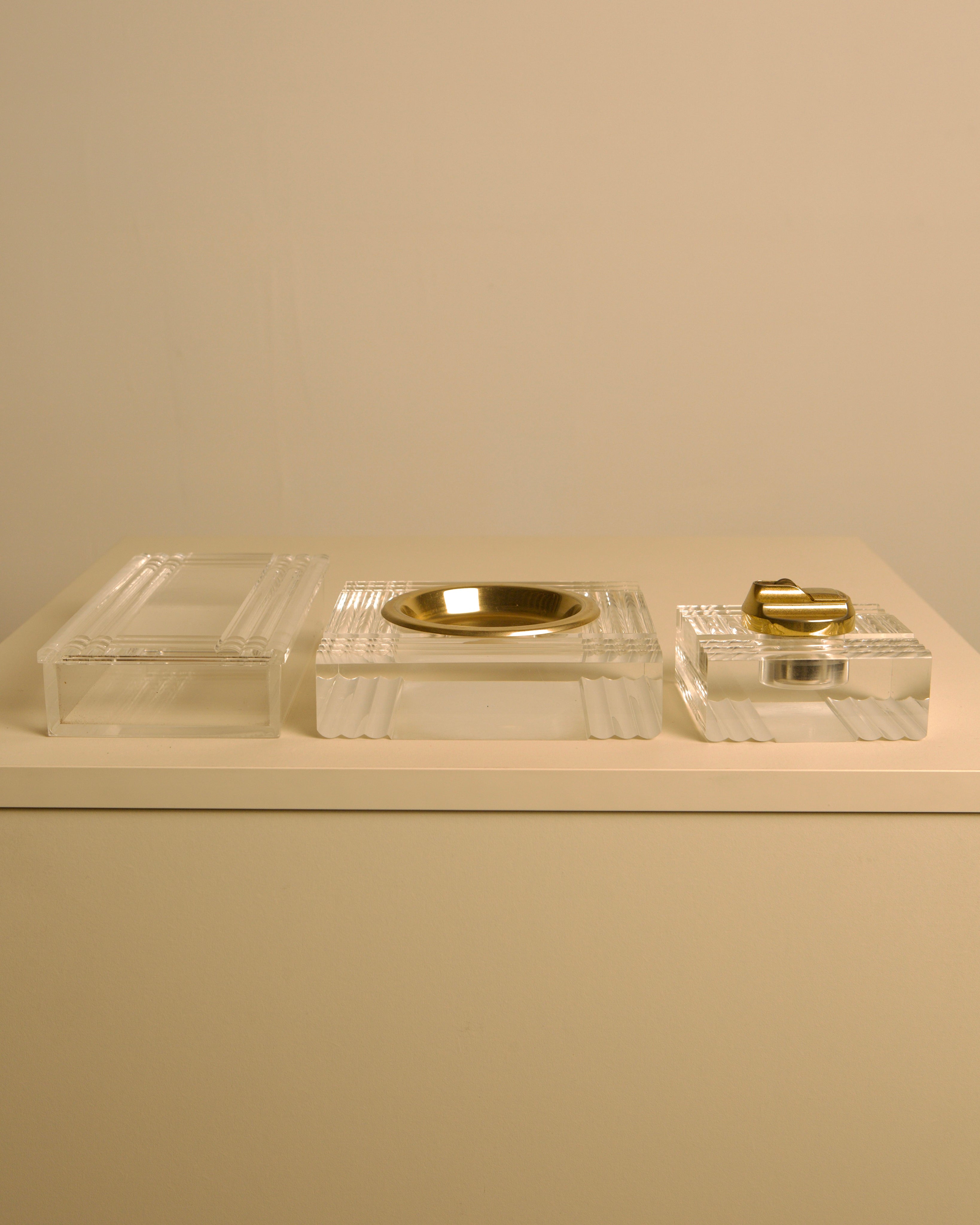 Italian Plexiglass and Brass Smoking Desk Set 70s — angled view on white surface