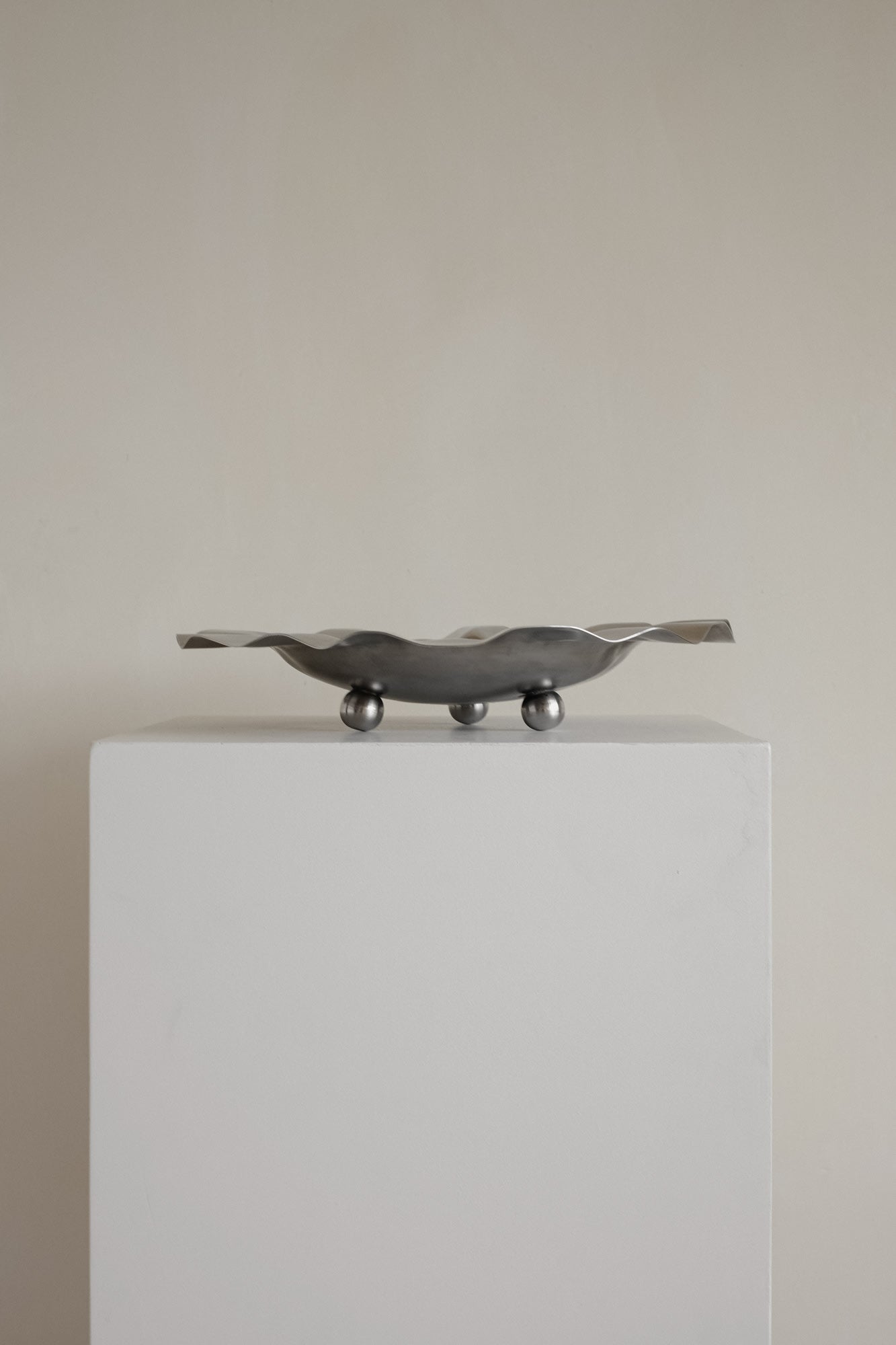 Wavy Display Bowl with Ball Feet — lifestyle setting