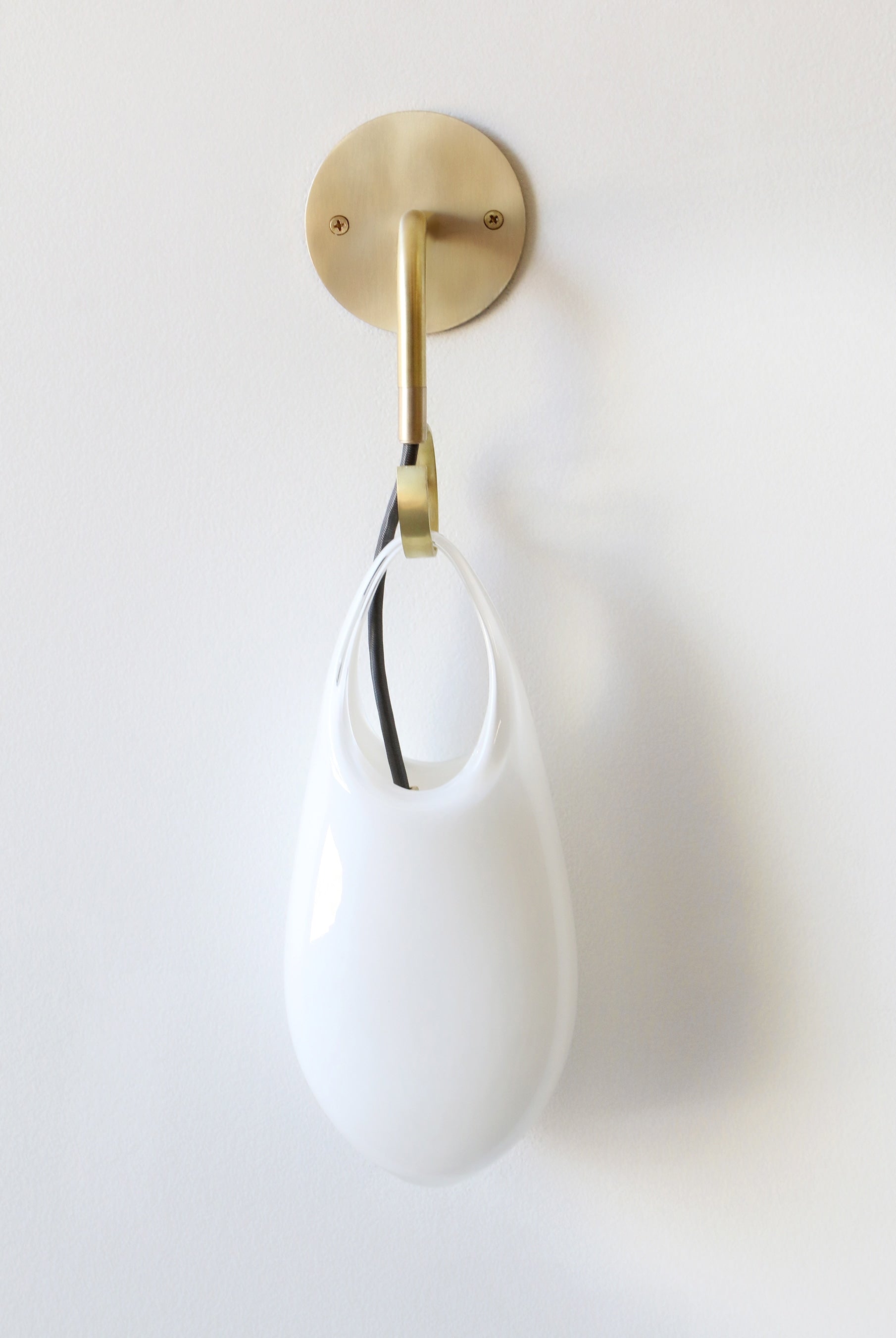 SkLO Hold 12 Sconce, White Glass, Brushed Brass, Black Cord by SkLO | The Oblist