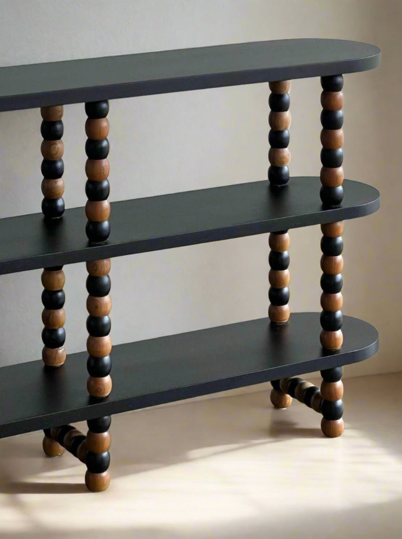 Onde Shelf — close-up of black and wood round legs