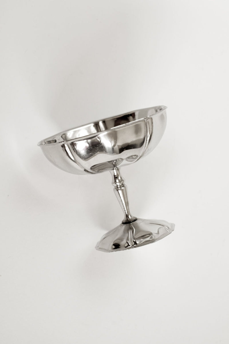 Set of Five Ice Coupes — close-up of polished metal surface