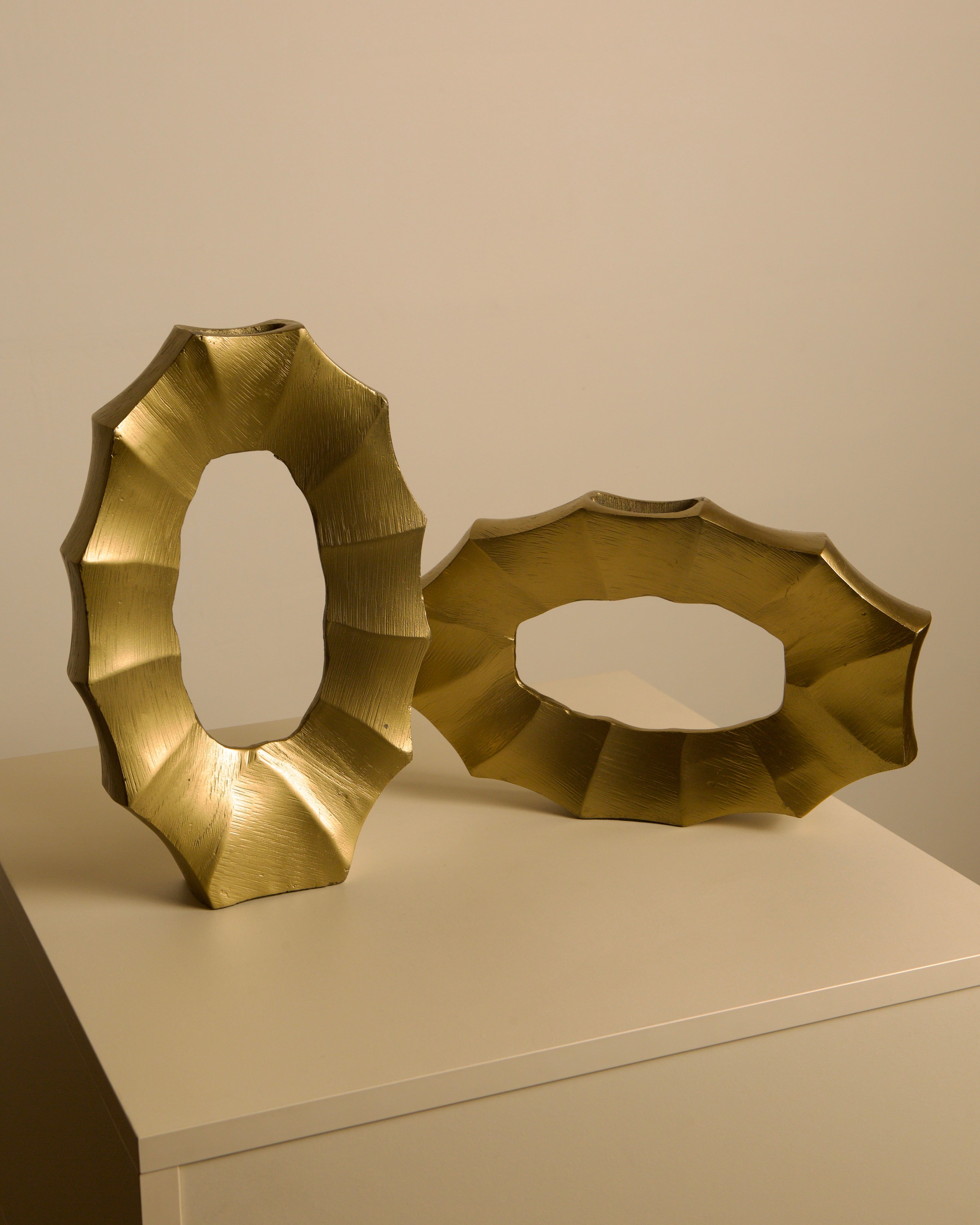 Pair of Italian 80s Gilt Aluminum Vases — close-up of textured gold surface