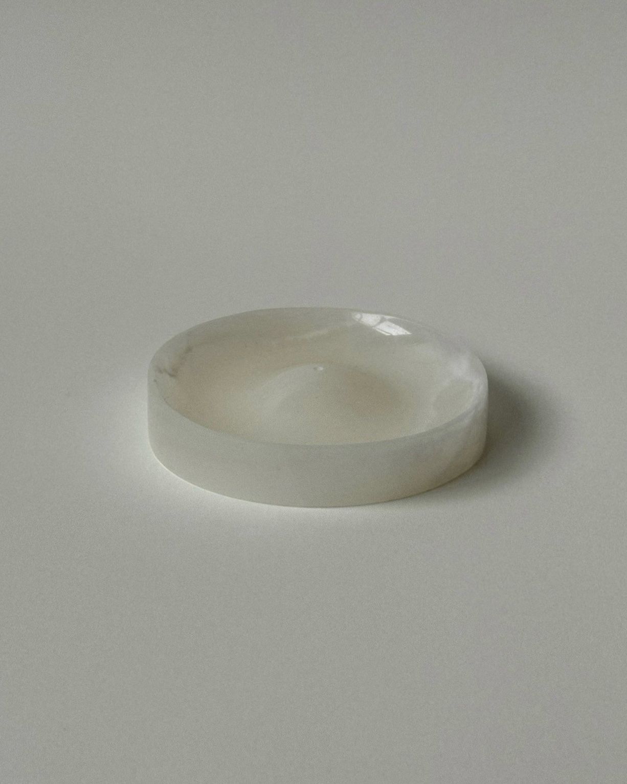 ALTAR' incense holder — close-up of white marble surface