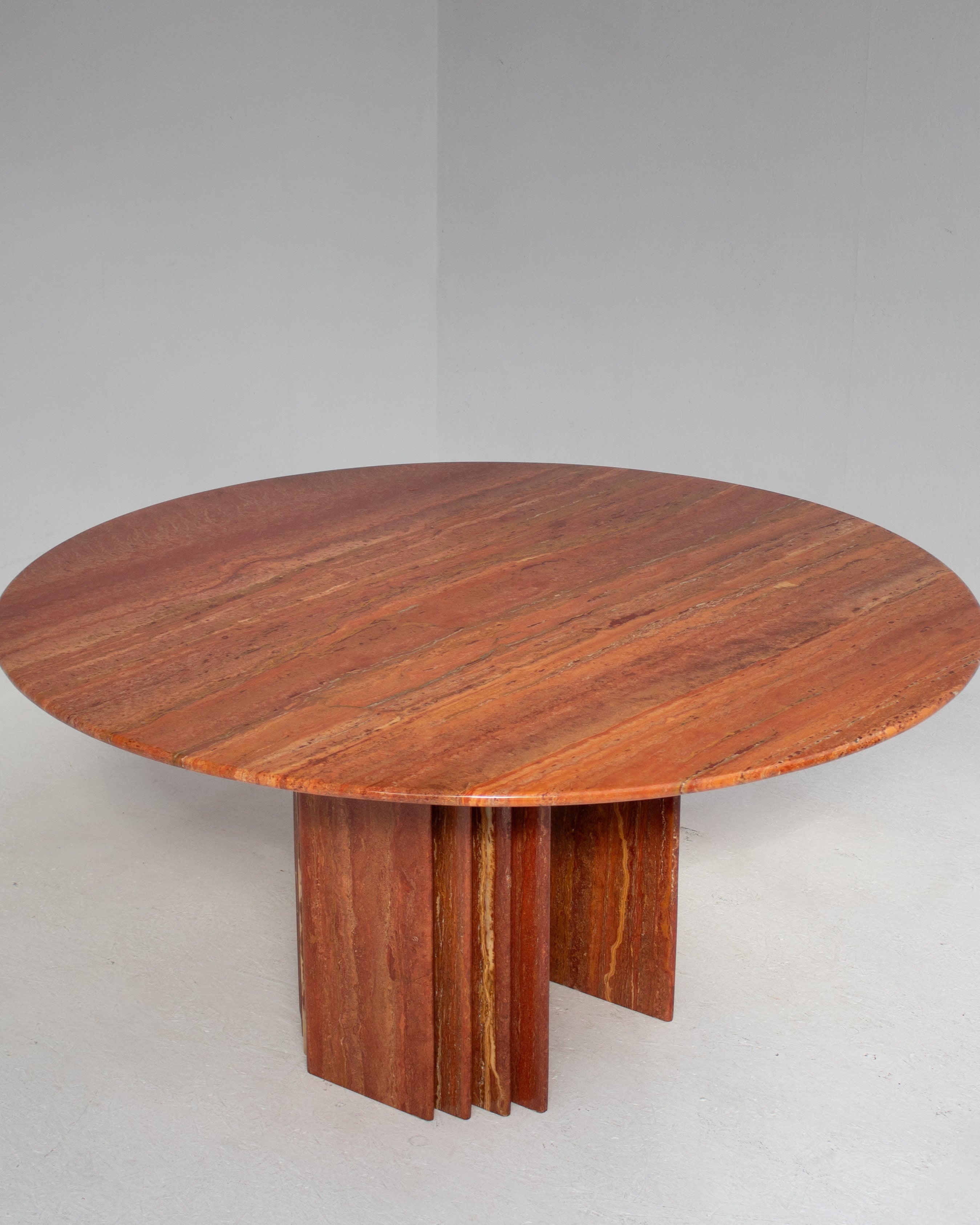 Round Dining Table in Rosso Travertino