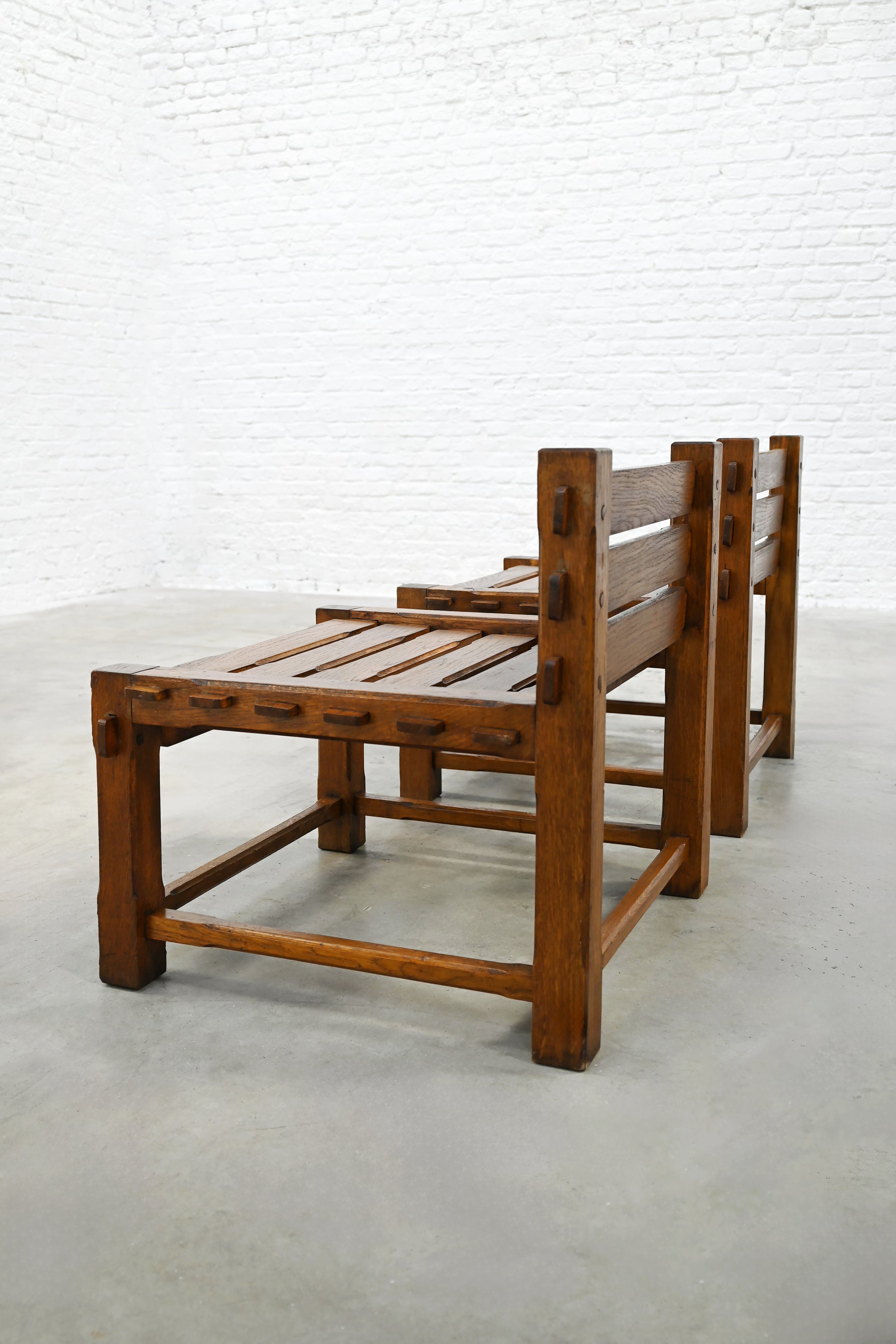 Brutalist oak side chairs showing slatted seat and backrest detail