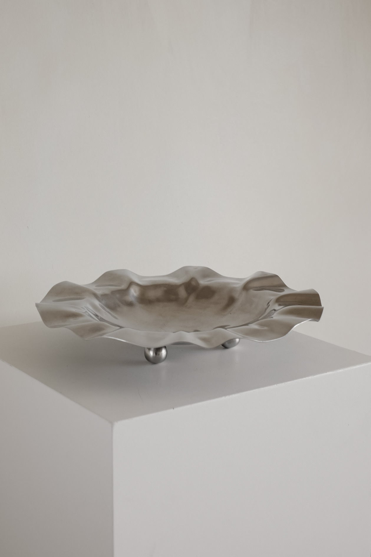 Wavy Display Bowl with Ball Feet — in context