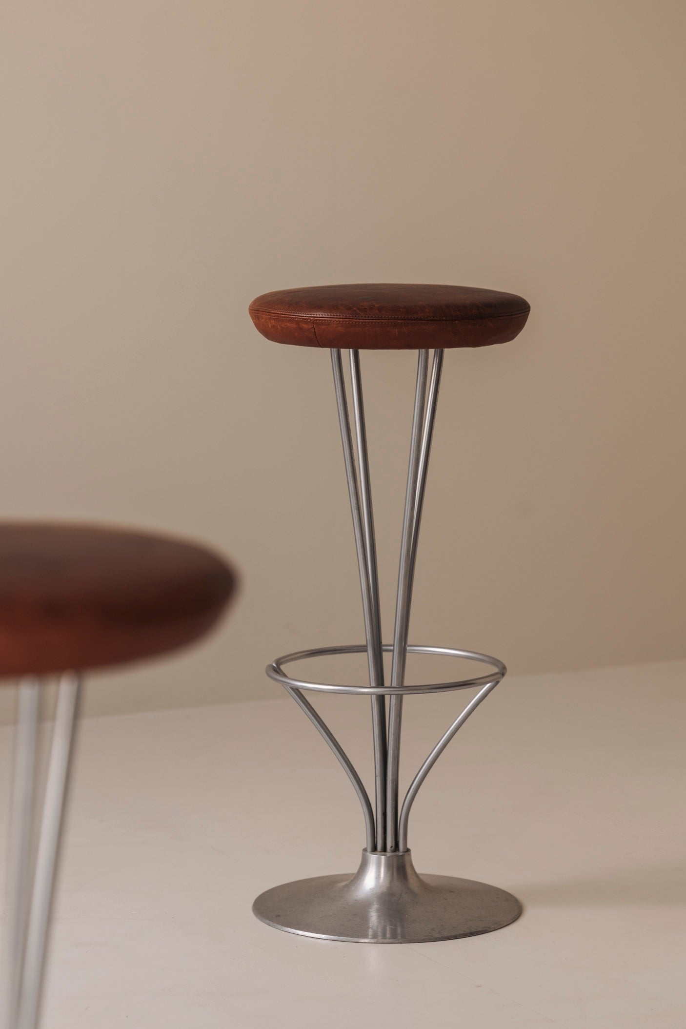 Set of Two Bar Stools in patinated leather by Piet Hein for Fritz Hansen, Denmark, 1960s — side angle