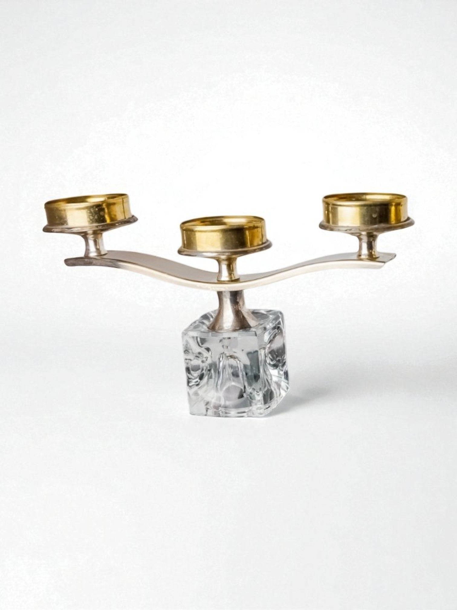 Ice Cube Candleholder by Peill & Putzler, 1970's — close-up of clear glass base with gold candle cups