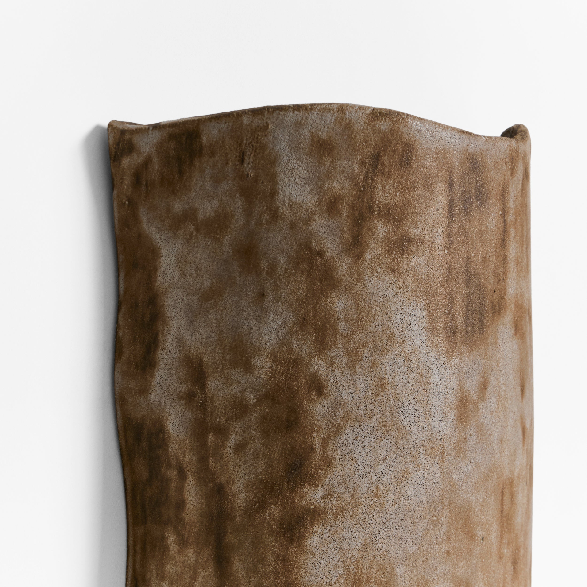 Papel Wall Light — back view showing textured brown fabric surface