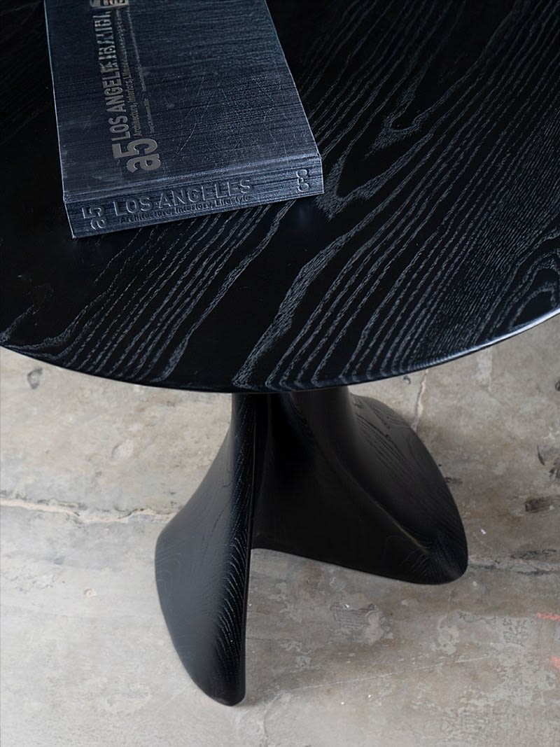 Sculptural Dervish Table in Ash wood Ebony stain — side angle