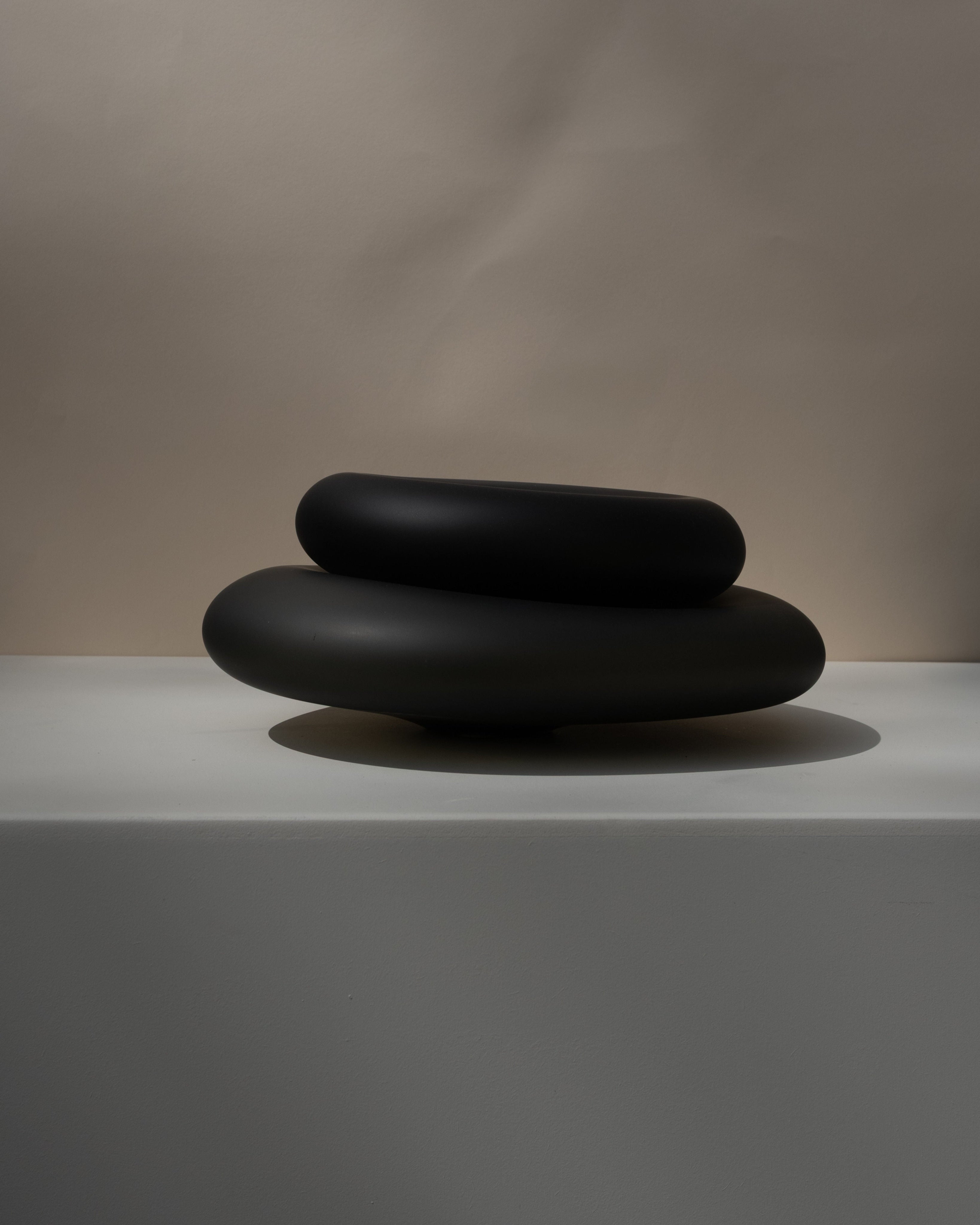 Glass Sculptures SEAGLASS | color midnight black — close-up of smooth glass surface
