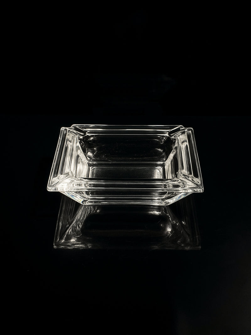 Italian Art Deco crystal glass ashtray / vide poche — top view on black surface
