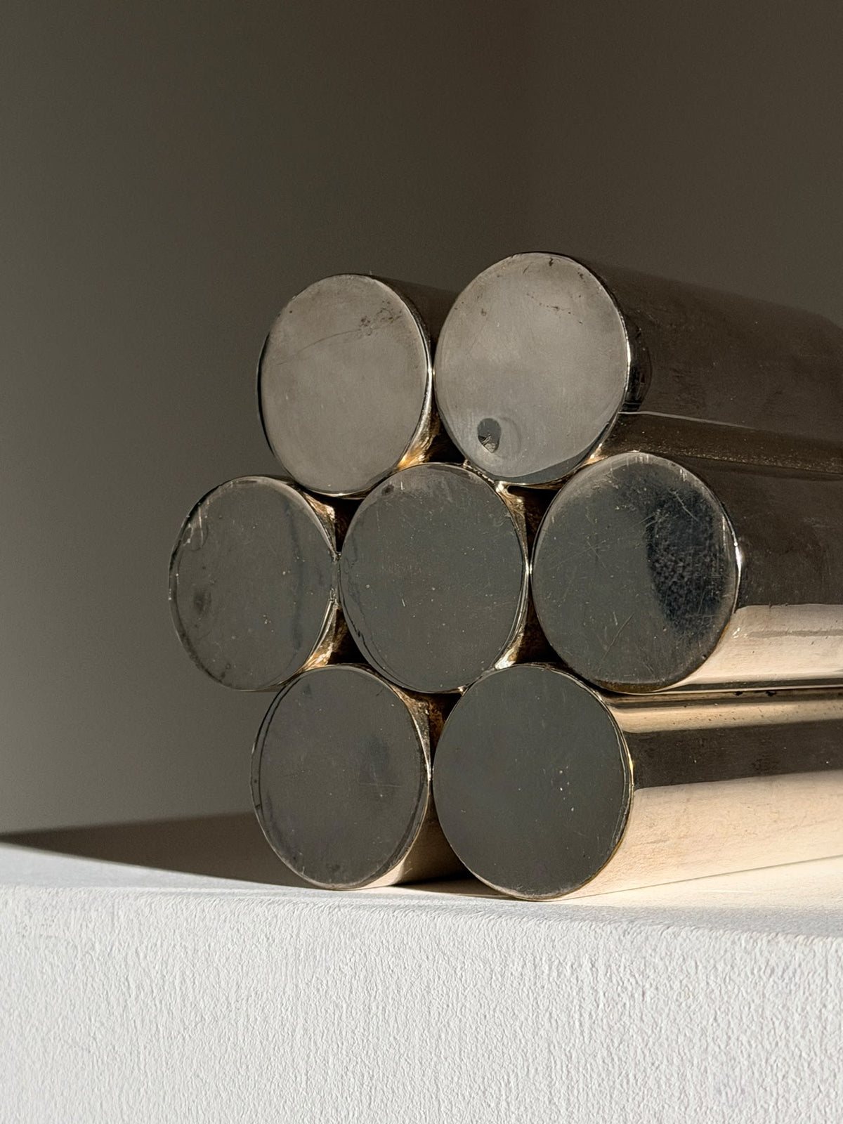 Sculptural vase in silver-plated metal, France, 1970s.  — lifestyle setting