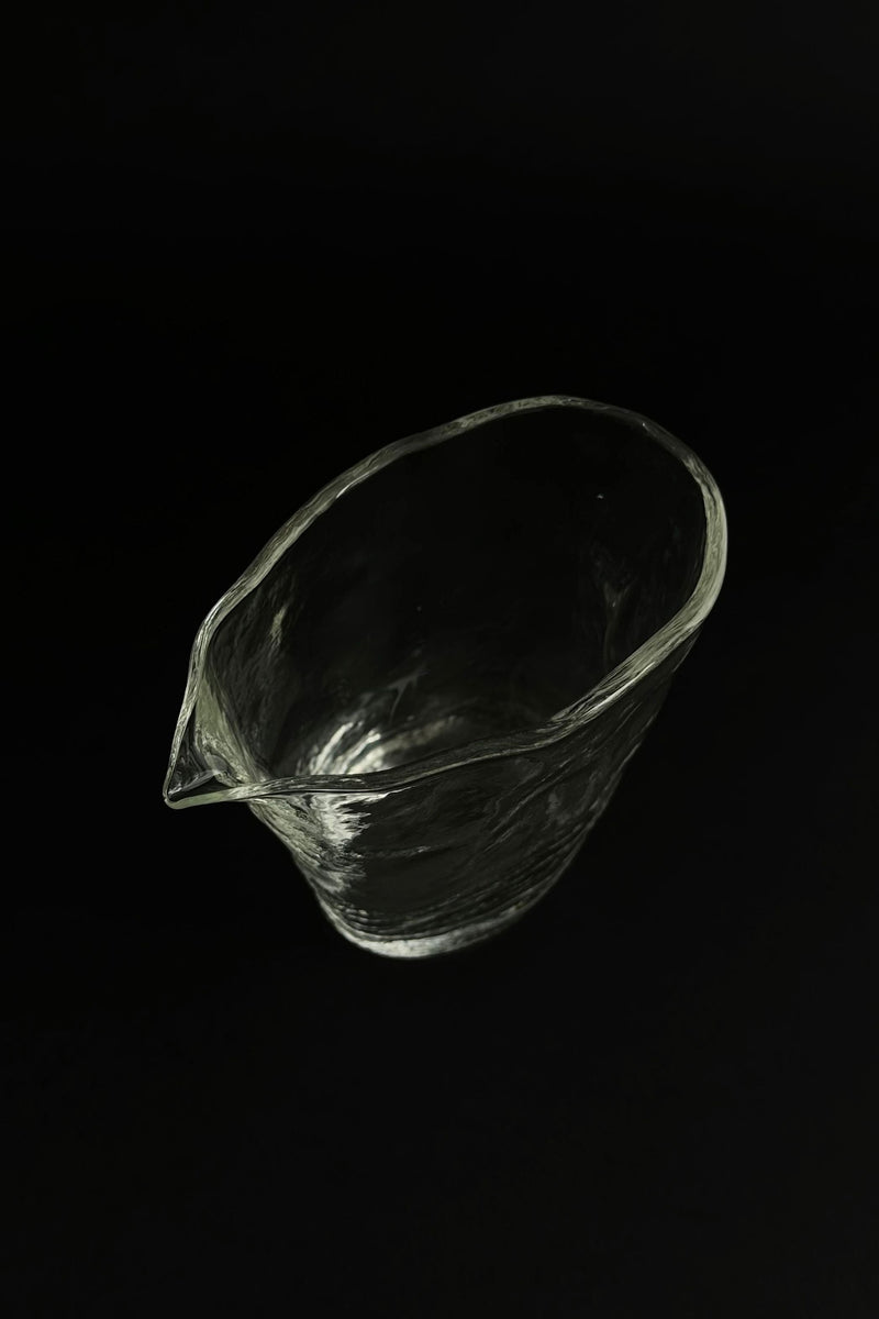 ELYSIUM' small glass pitcher — top view highlighting clear glass texture