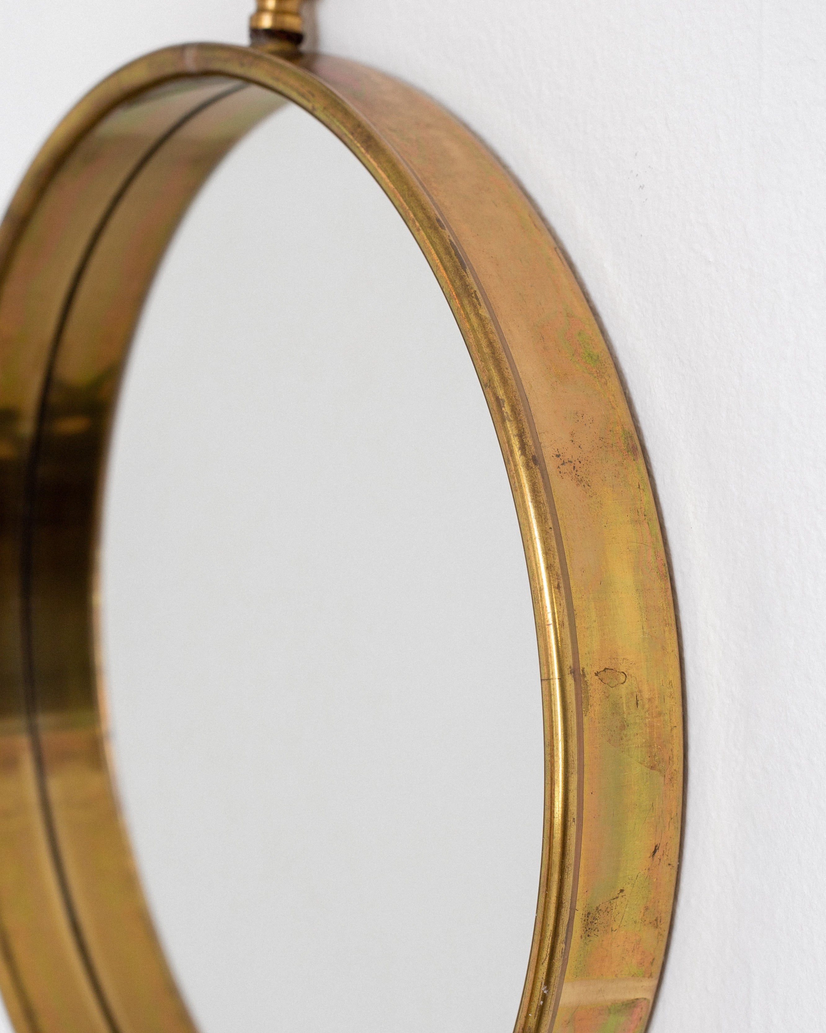 Scandinavian Mid-Century Round Brass Mirror — back view highlighting brass finish
