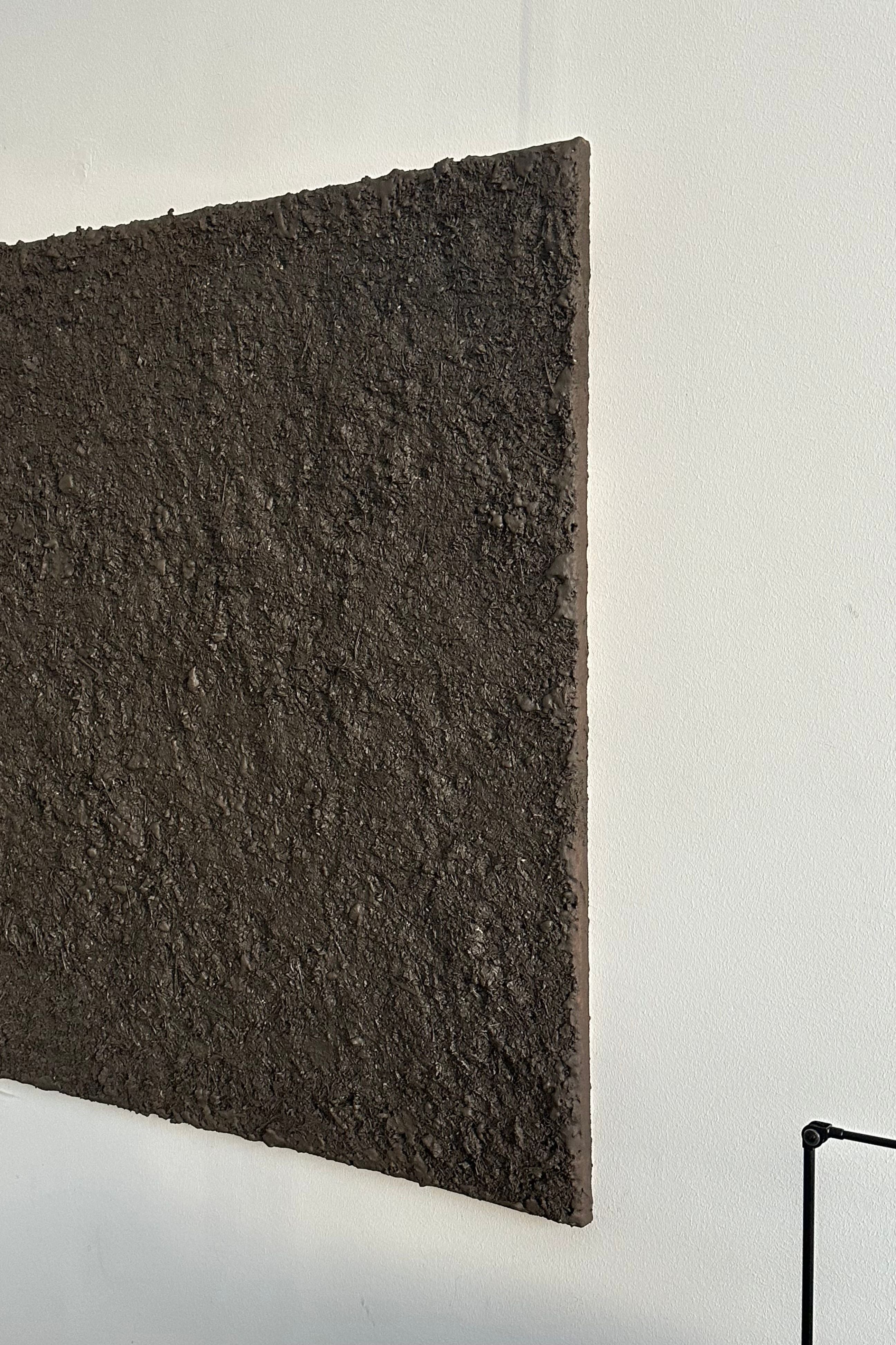 ARCHE 07' sculptural wall art — angled view of textured dark surface