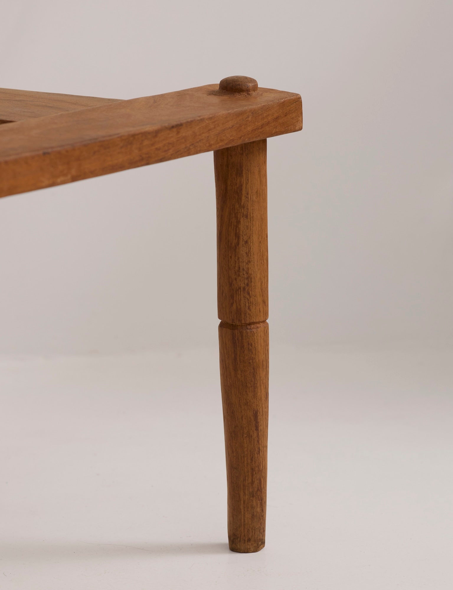 Large one-of-a-kind Baoulé chair in solid wood — close-up