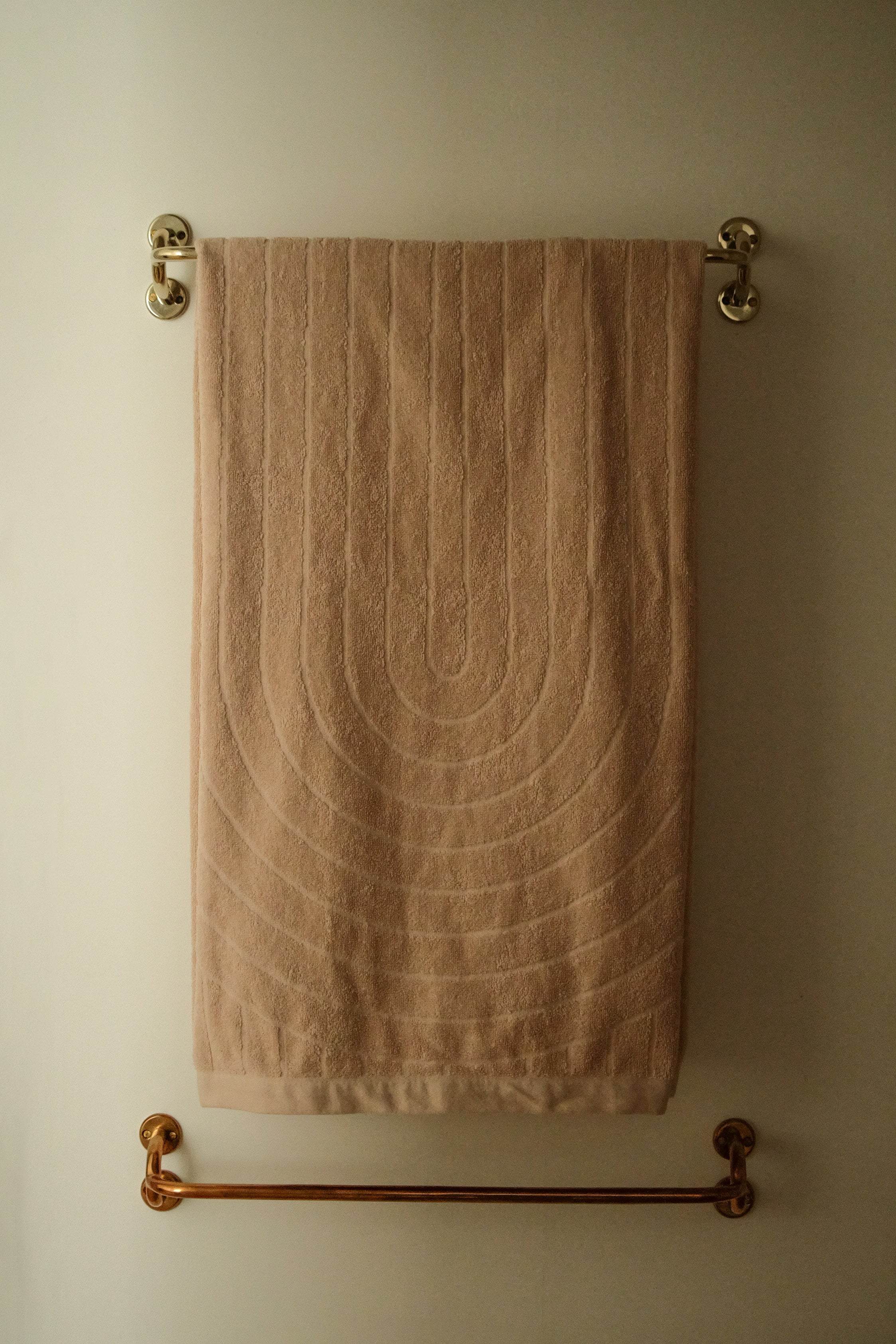 FAUNA Towel Bar (2 sizes) — back view with towel in soft beige
