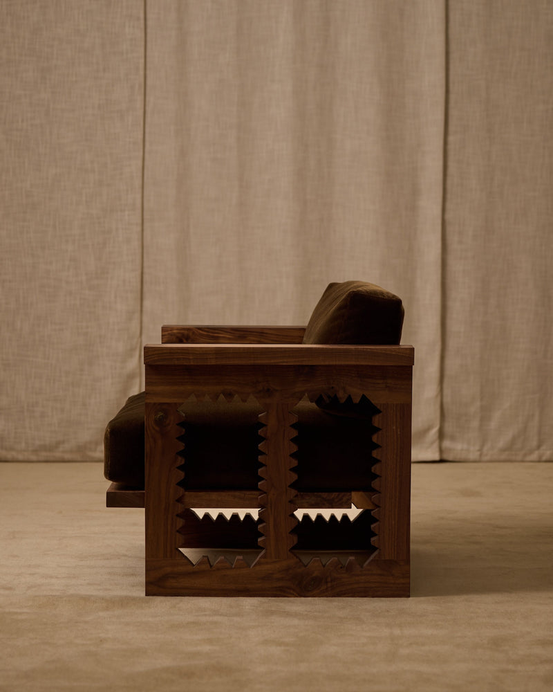 Jura wooden armchair with geometric lattice pattern detail