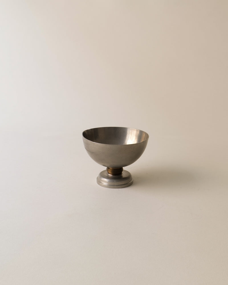 Pewter footed bowl by CG Hallberg Sweden on white background