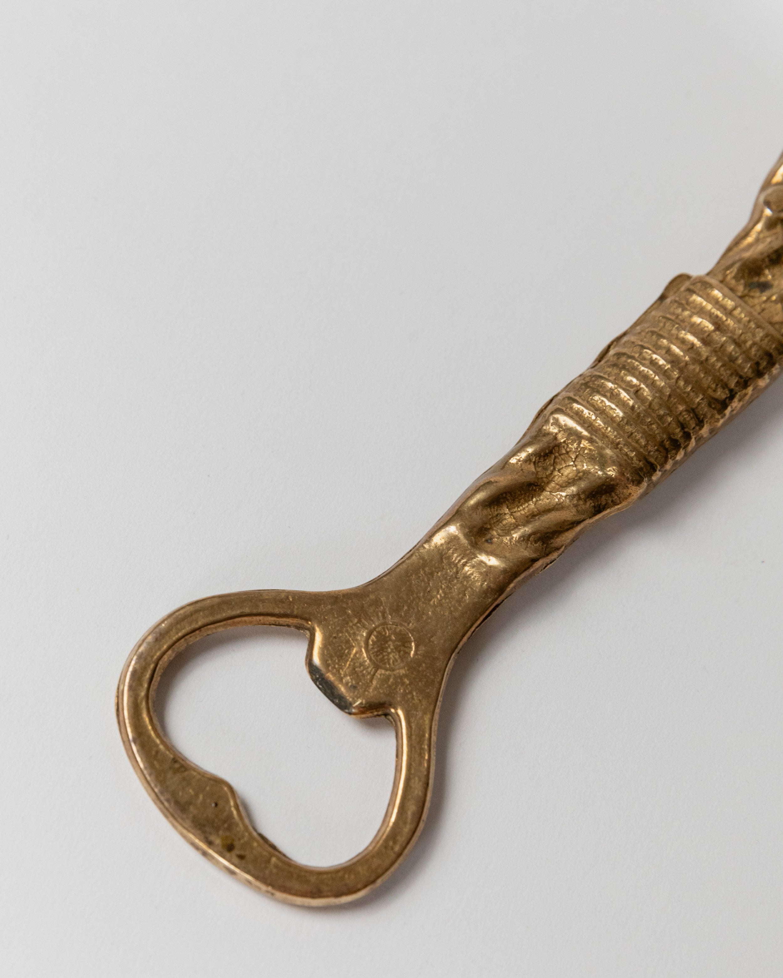 Brass bottle opener with ribbed handle detail, Italian 1960s design
